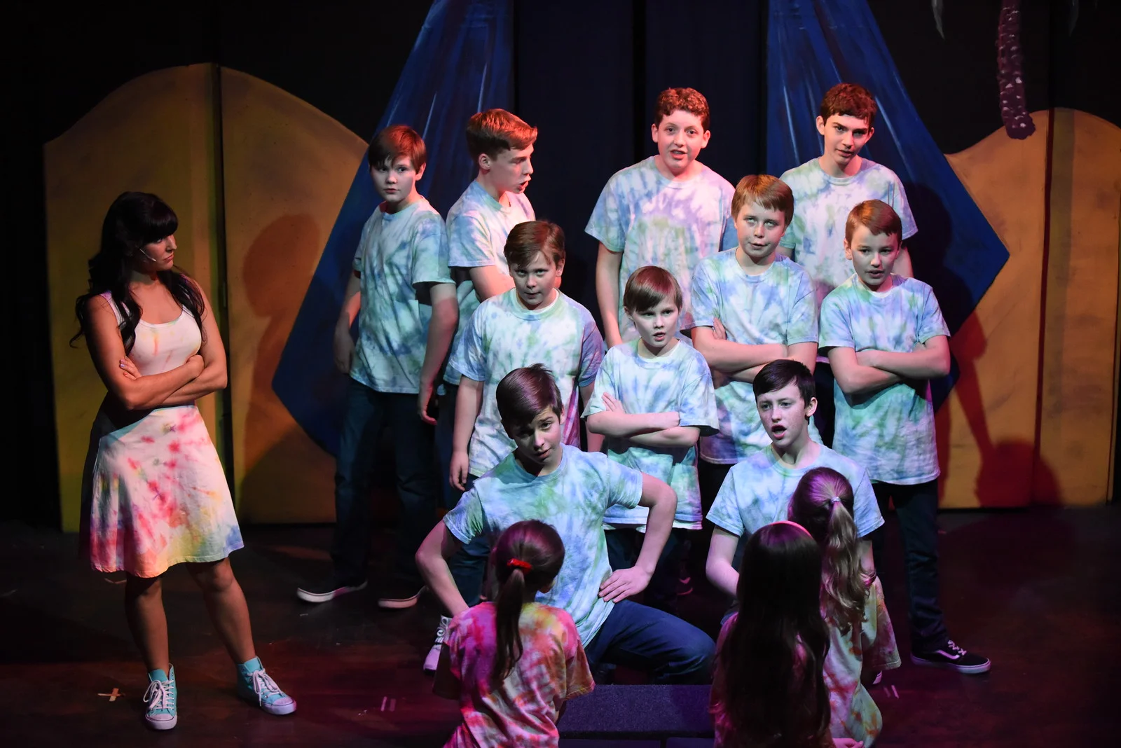 Allison Chicorel, left, as the Narrator appears with Joseph's brother's in a scene from The Box Theatre's "Joseph and the Amazing Technicolor Dreamcoat."