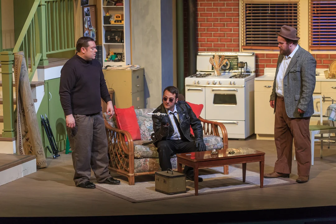 Con men, from left, Mike (Zack Oliver), Roat (Casey Van Dam) and Carlino (Logan Milway) plan their strategy to find a doll that contains a huge amount of heroin in a scene from Waukesha Civic Theatre's "Wait Until Dark.