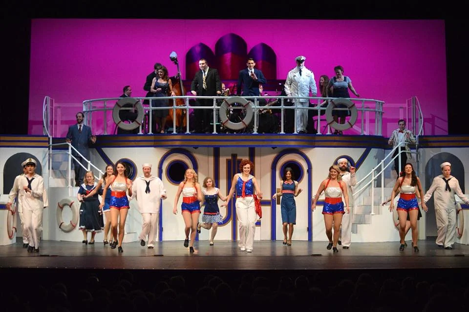 Reno (Morgen Aria Clarey), center, leads her Angels and others in a snappy dance routine in a scene from Falls Patio Players "Anything Goes."