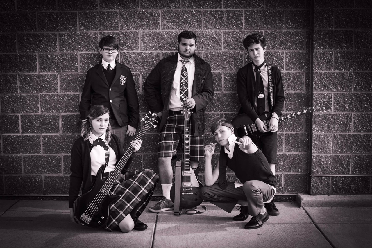 Members of the School of Rock band strike a pose befitting their rock star status in "The School of Rock," presented by Sudbrink Publications. Pictured are, from left top, Lawrence (Ryan Vanselow), Dewey (Thomas Madrzak), Zack (Cian Radcliffe), bottom, Katie (Ivy Broder) and Freddy (Zander Tomes). 