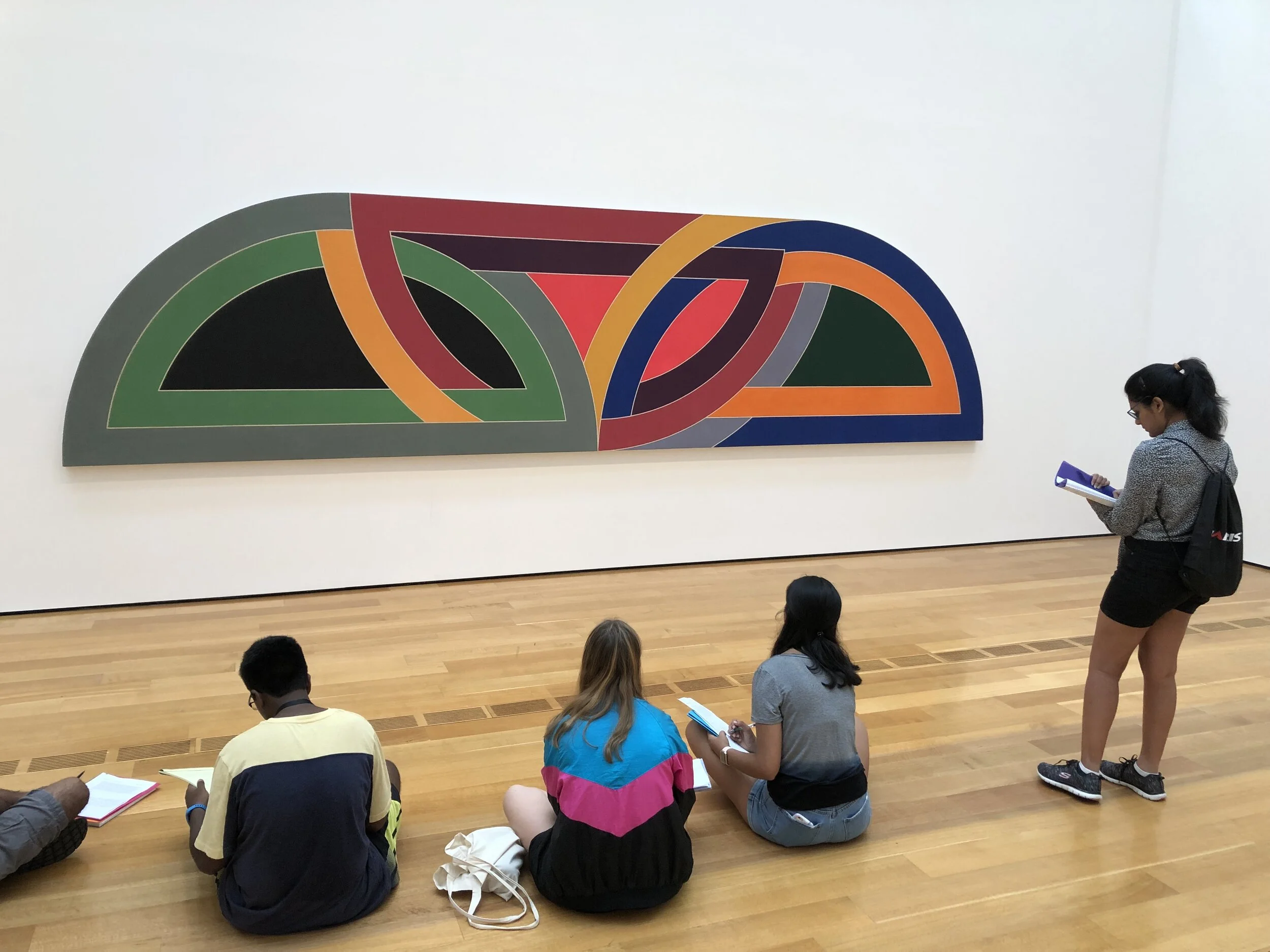 Students viewing "Manteneia I" by Frank Stella at the High Museum of Art in Atlanta, September 2019.