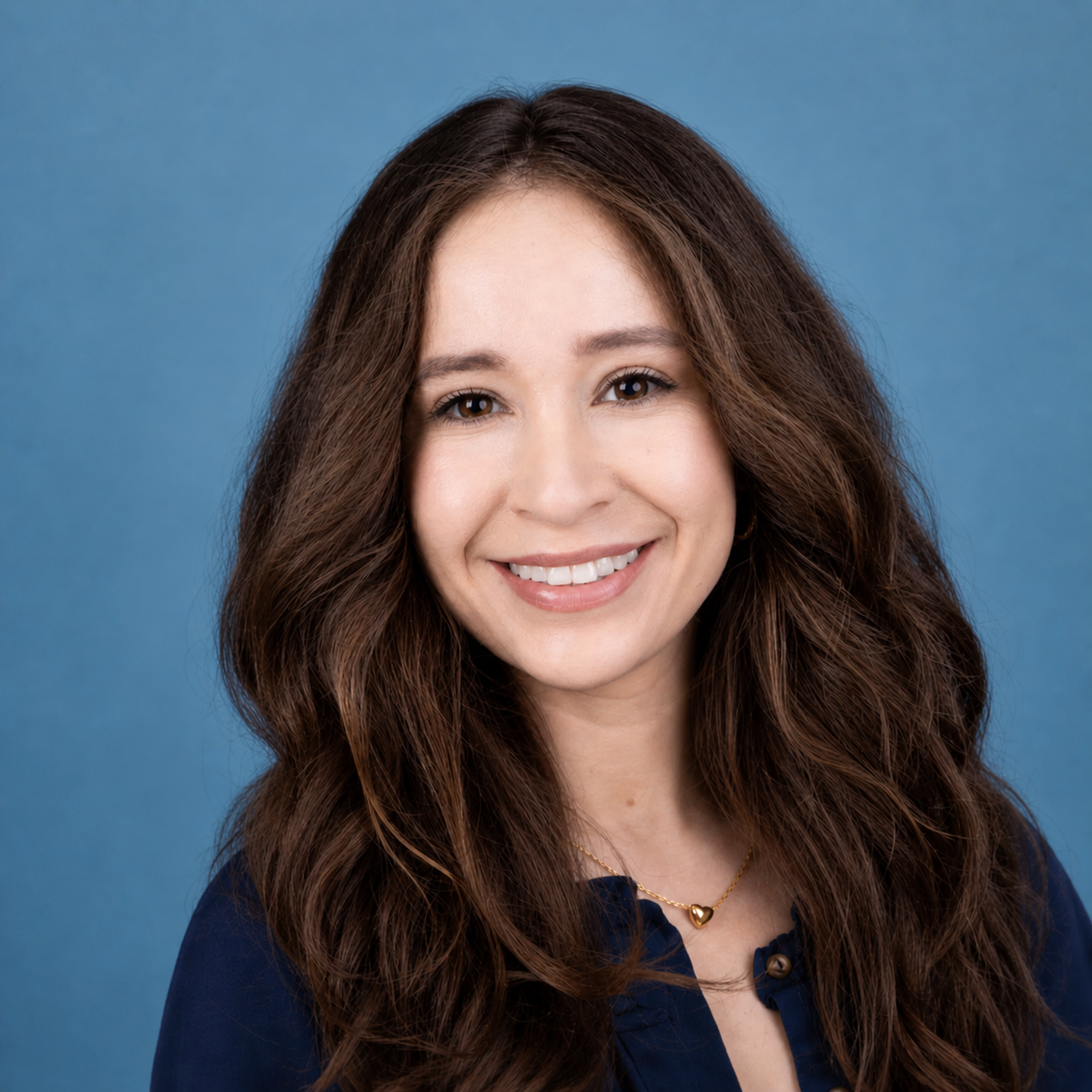 Karina Almanza Headshot 2026 1.png