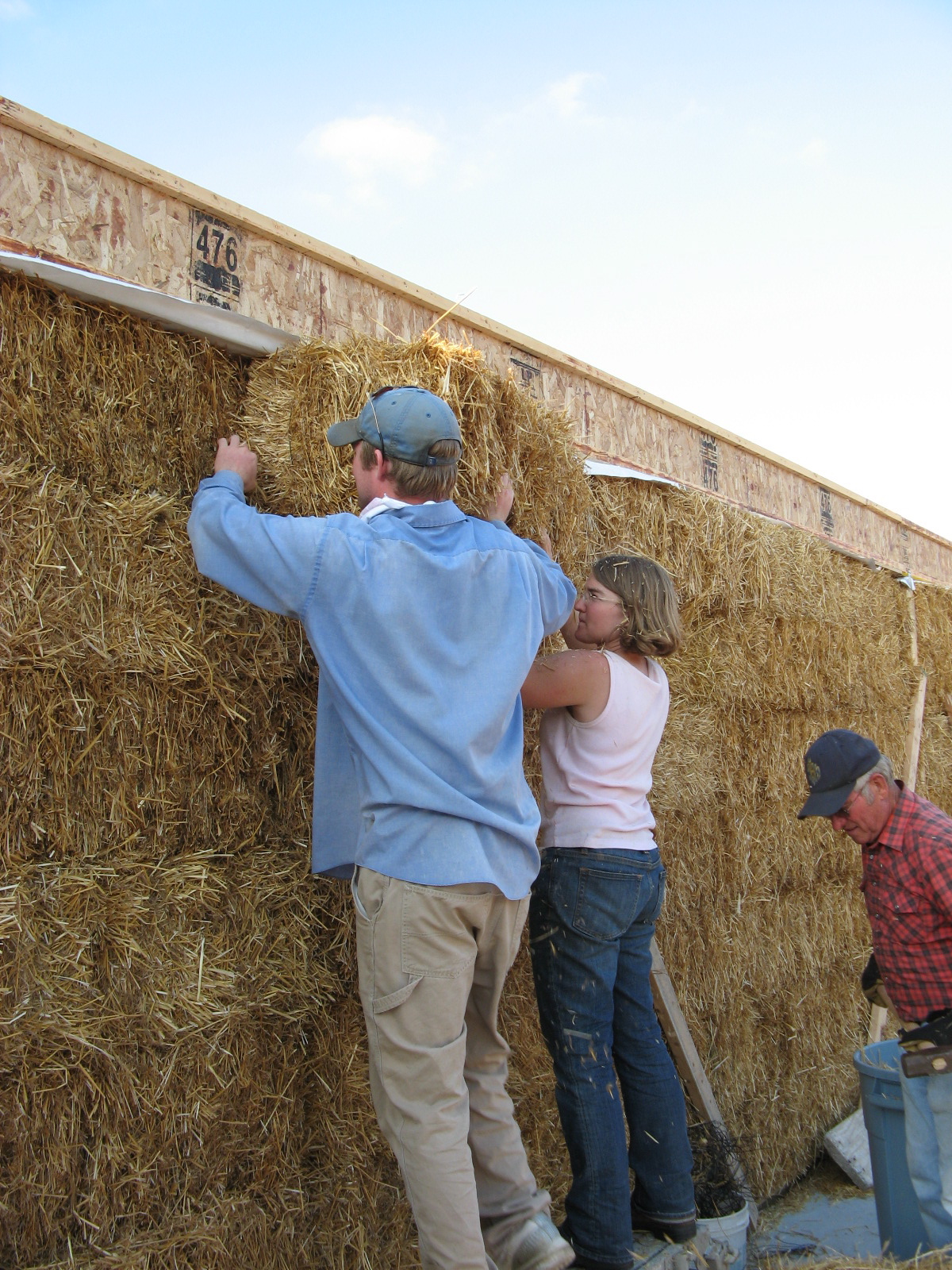  Eric &amp; Emily putting in the last bale! 
