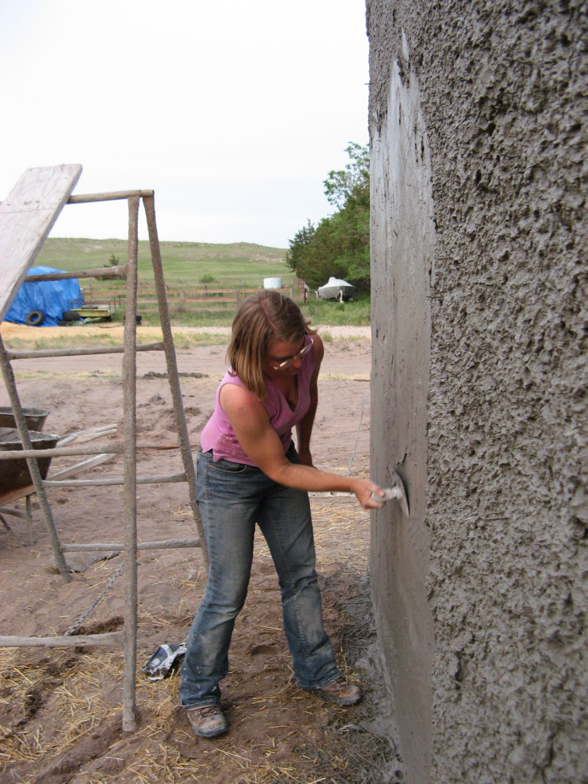  Emily troweling stucco 