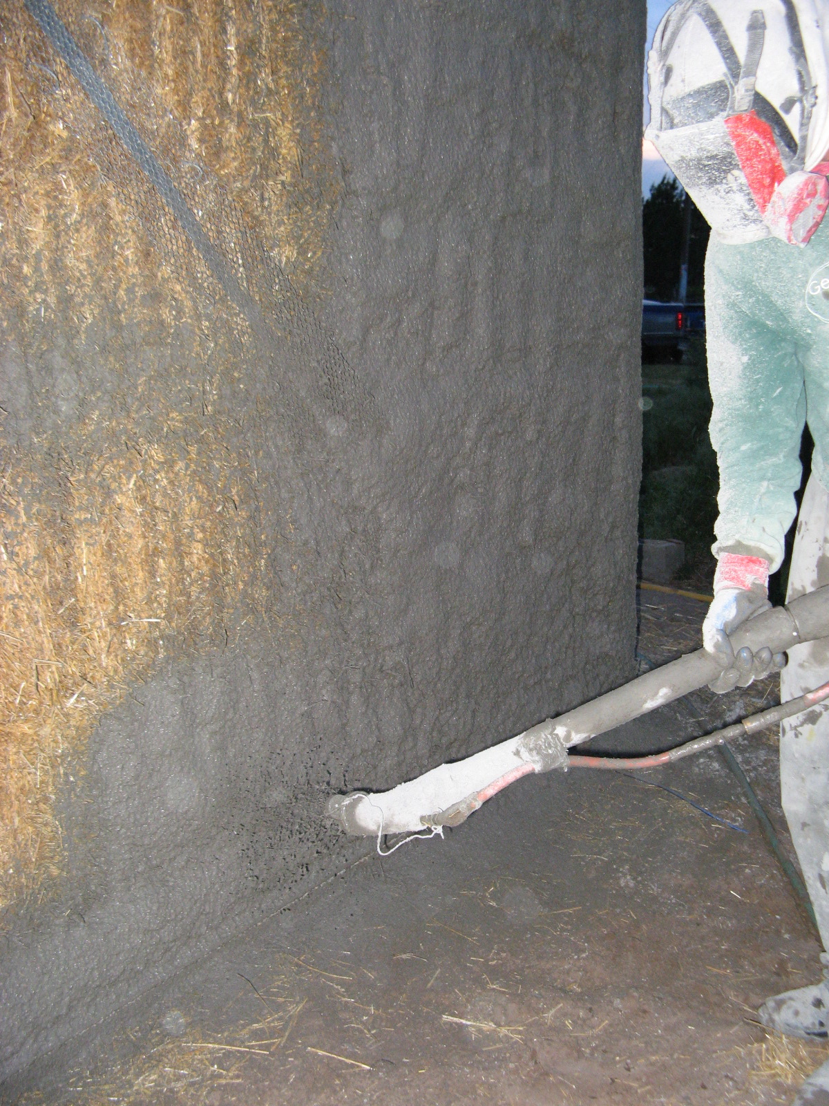 Tony spraying stucco