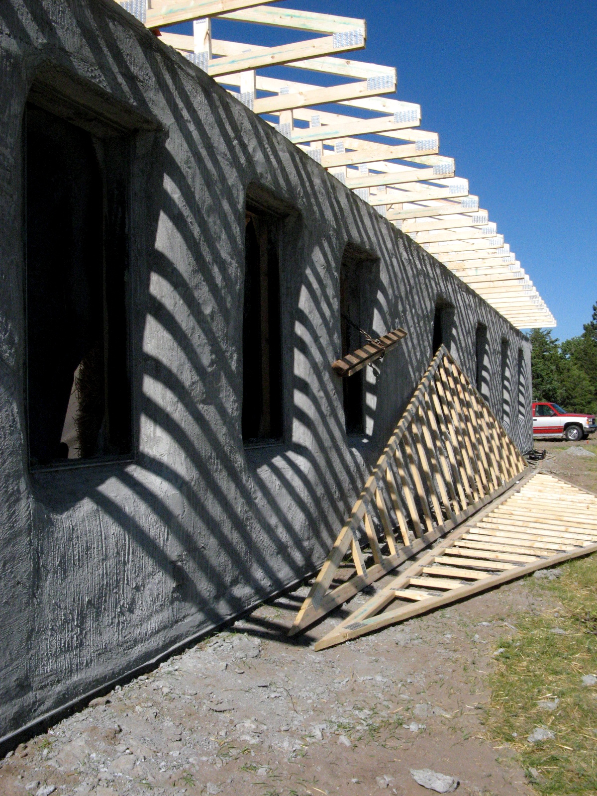  Here you can already see that the roof overhang will shade the windows completely in summer (and let the sun shine in during the winter for passive solar heating). 