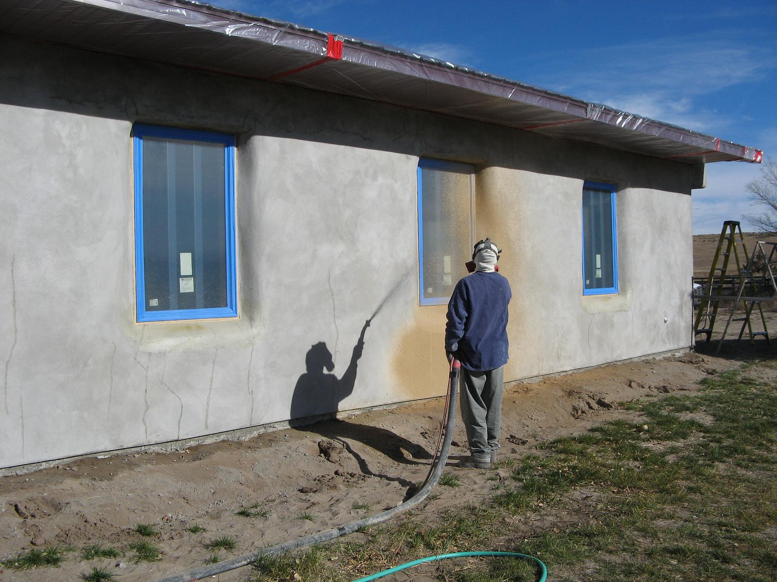  Tony starts spraying on the color coat 