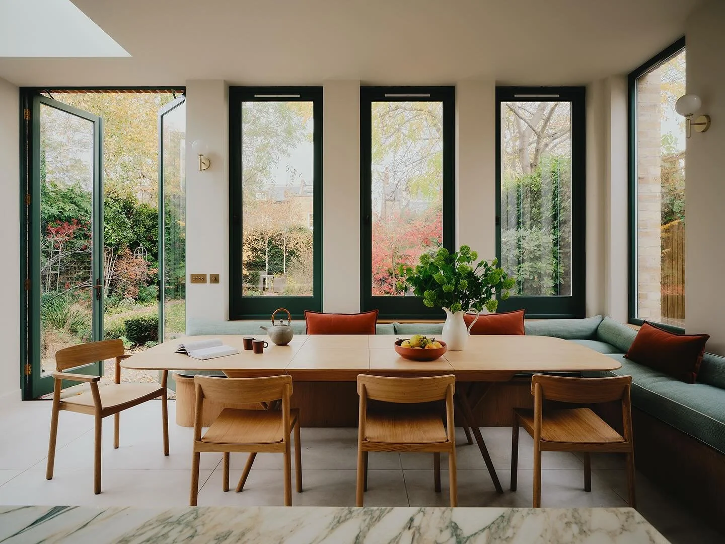 Both sides of the kitchen, dining space from our Herne Hill house. A stunning and seamless extension design, where we went big on natural materials and tones, connecting to the epic garden. 

We worked closely with the architect and joiners to delive
