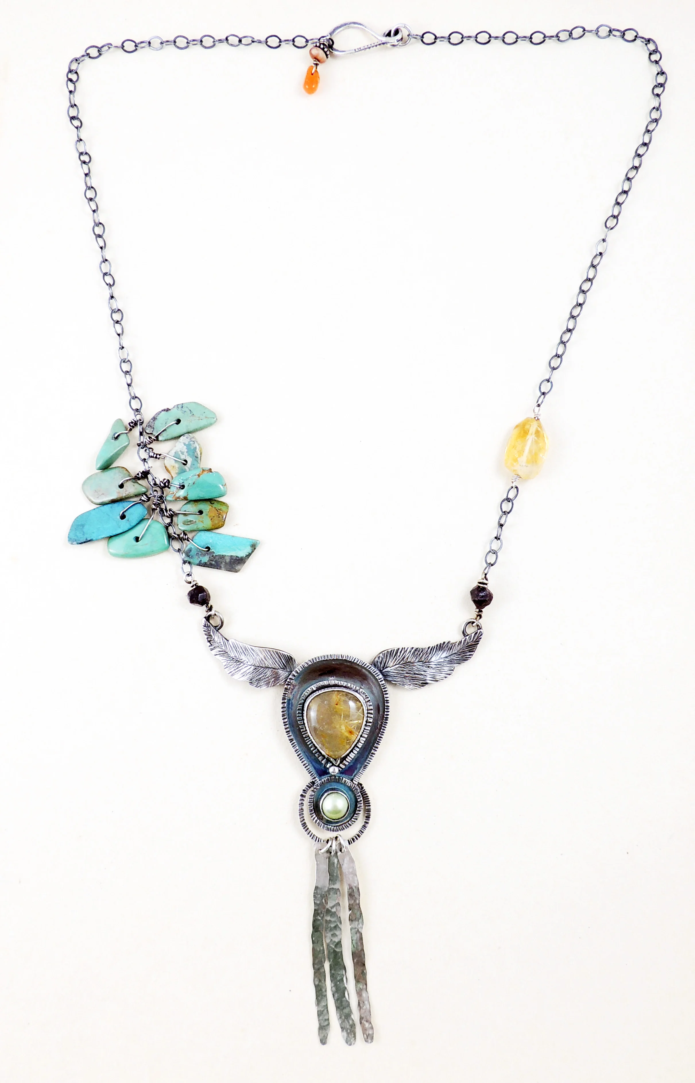 skull feathers necklace.jpg