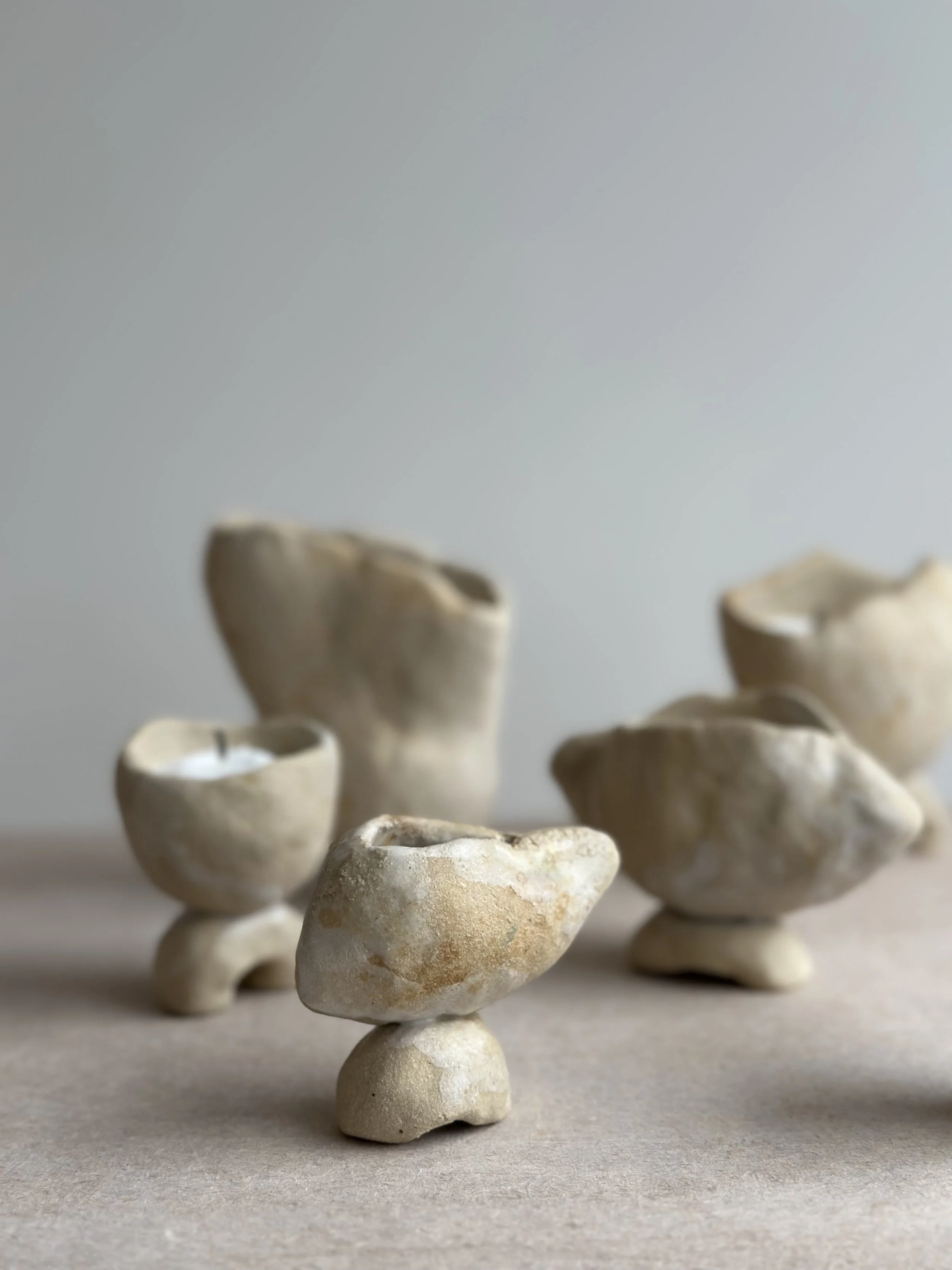 Aronui Vessels_set_sand_close_vert.jpg