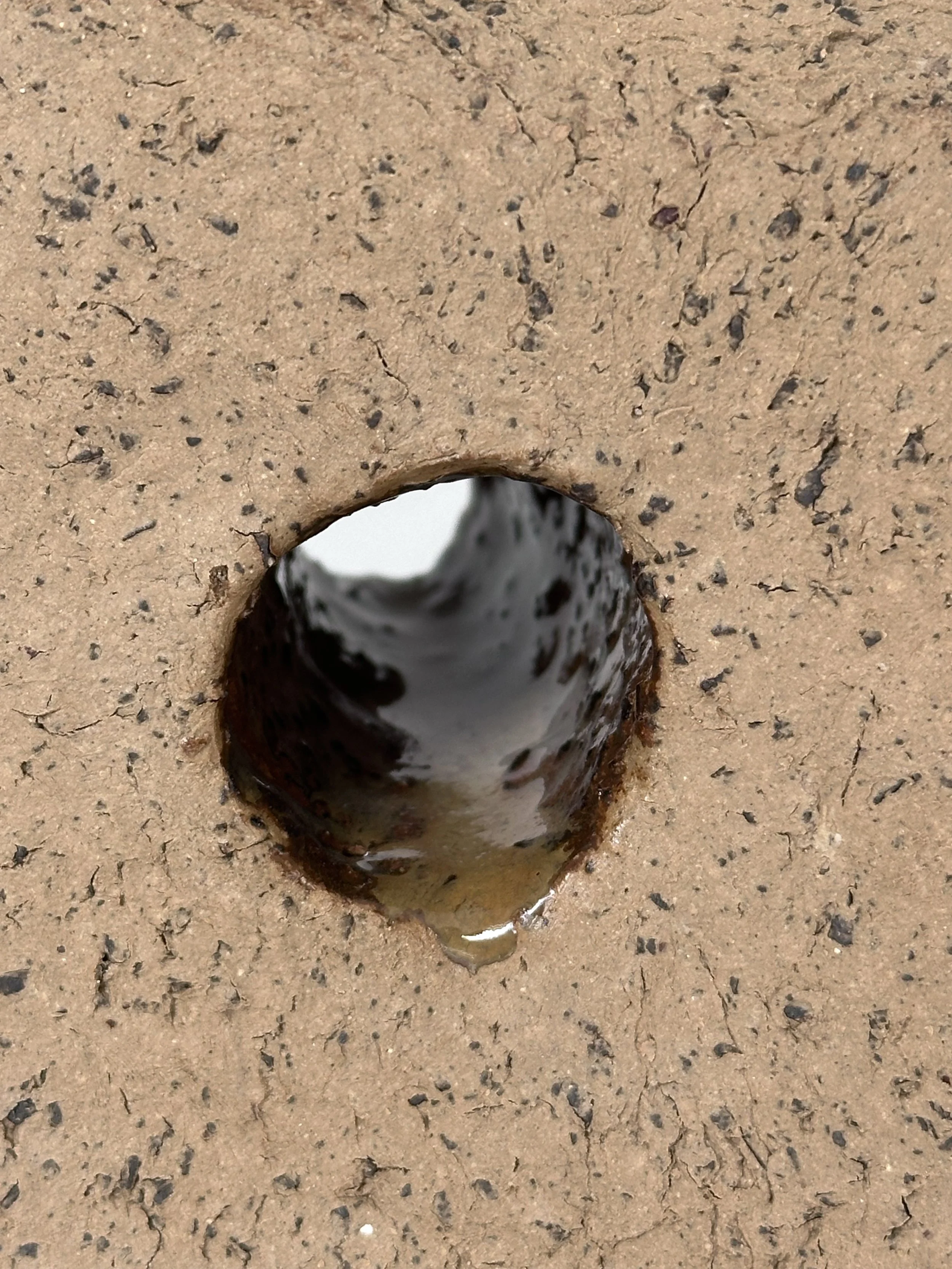 Moai Sculpture_closeup_glaze_hole.jpg