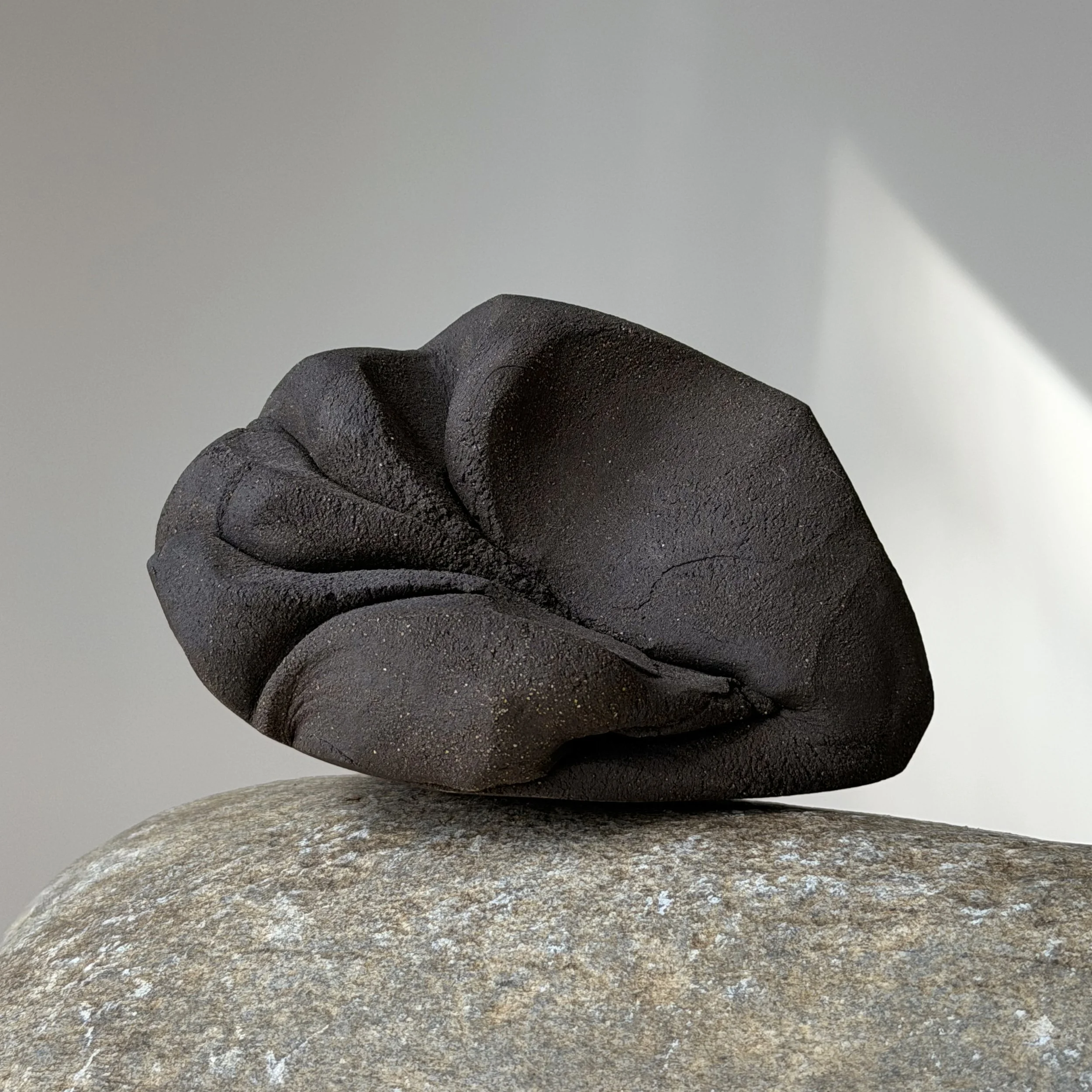 Pouri Sculpture_stone_SQ.jpg