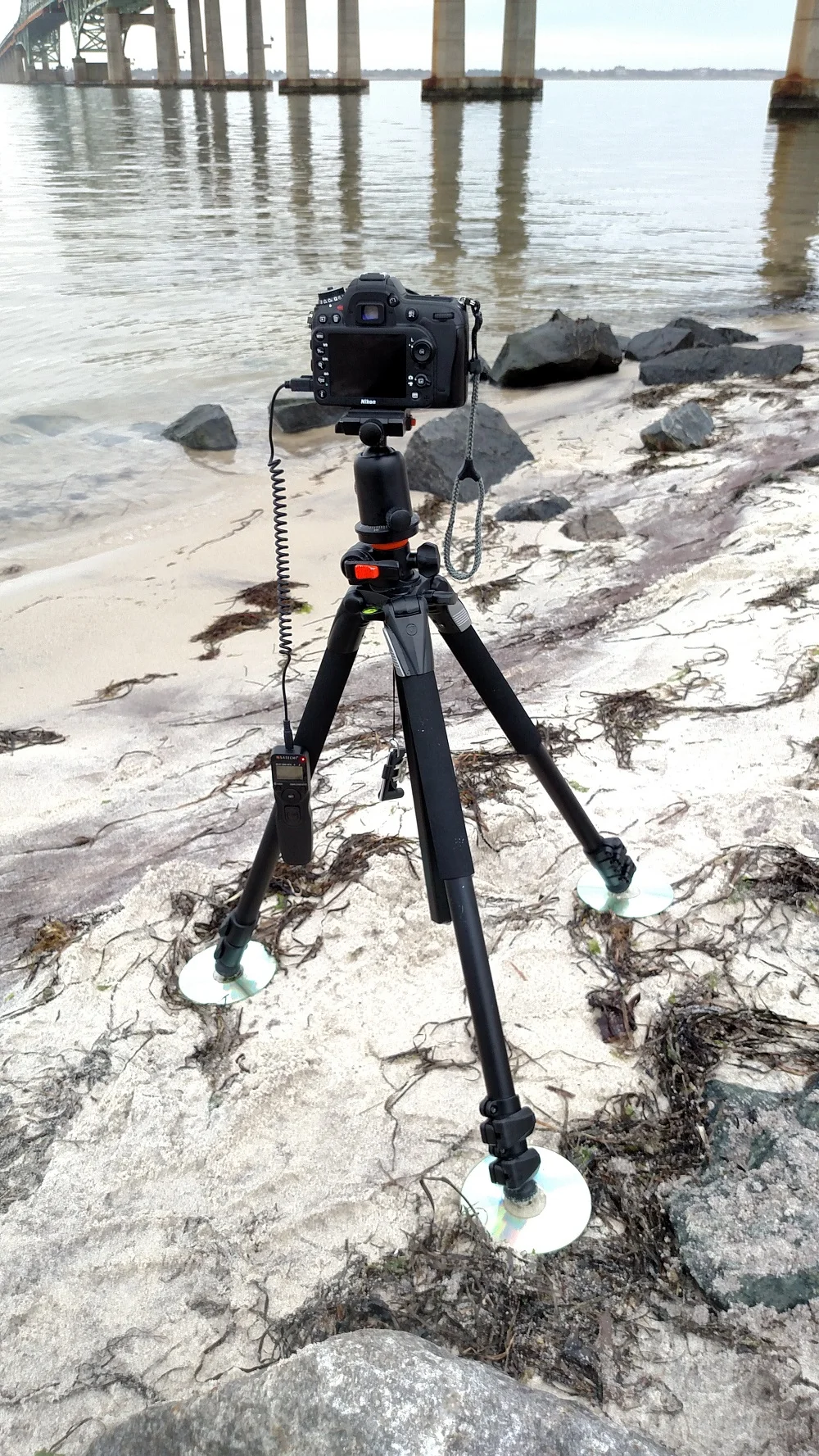 Here's my setup, I'm using my Vanguard Alta Pro tripod placed on CDs (I recently started keeping these in my bag to prevent sinking into the sand) and I have my cable release plugged in.