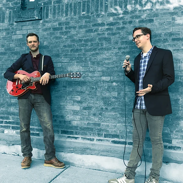 Chris with guitar, Grant with microphone/inflated sense of self.