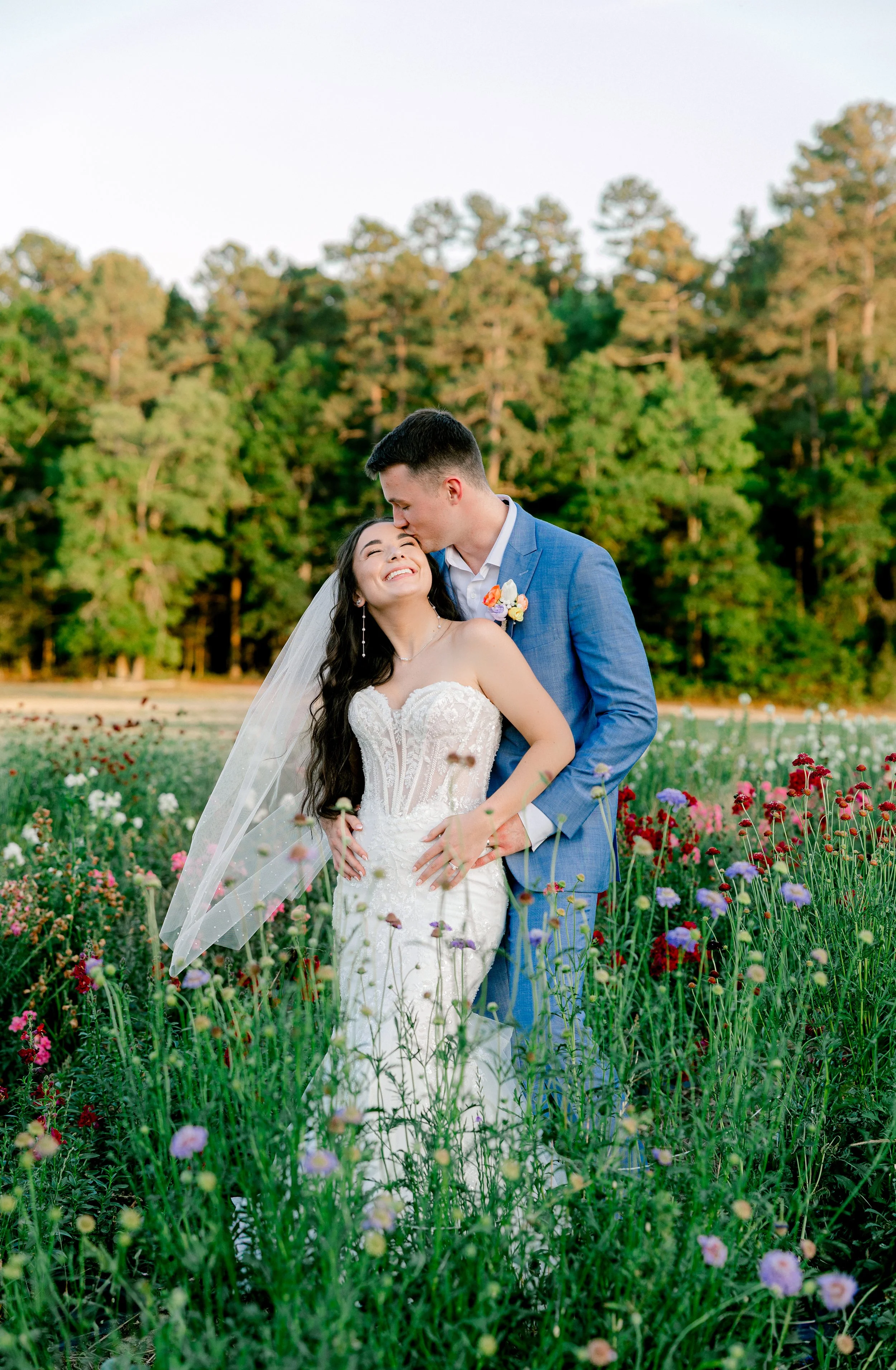Bride and Groom in flower field