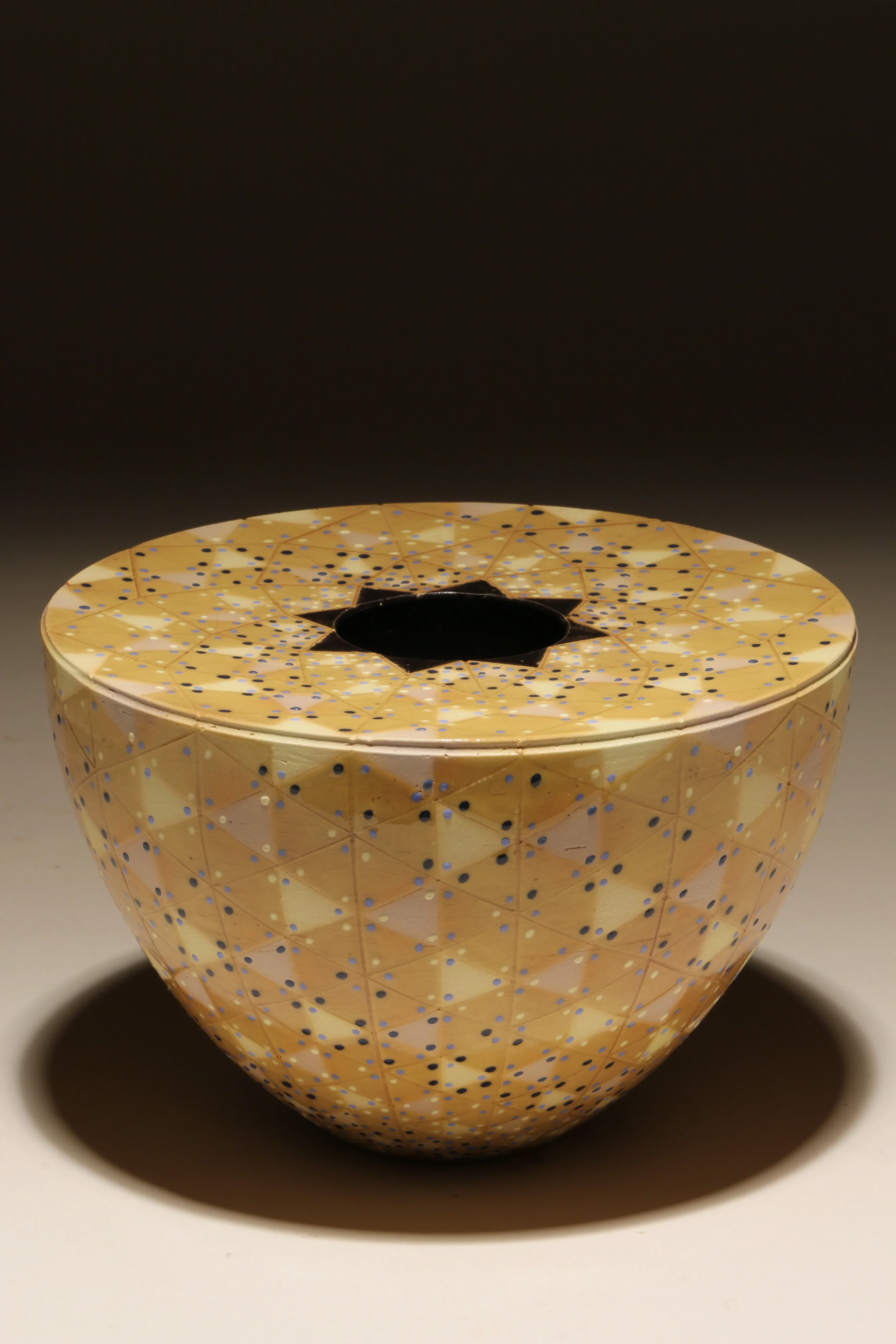   Kaname Takada  | Kaname Takada  Use Coupon Code: CCADsp21  My decorative and functional work utilizes various slip and glaze decoration techniques on earthenware and stoneware. Designs are hand crafted first on greenware with colored slips and othe