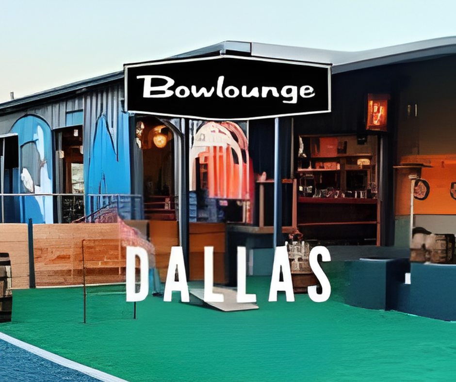 Exterior of a bowling lounge in Dallas with a sign that says 'Bowllounge' and large white letters spelling 'DALLAS' in front of green artificial turf.