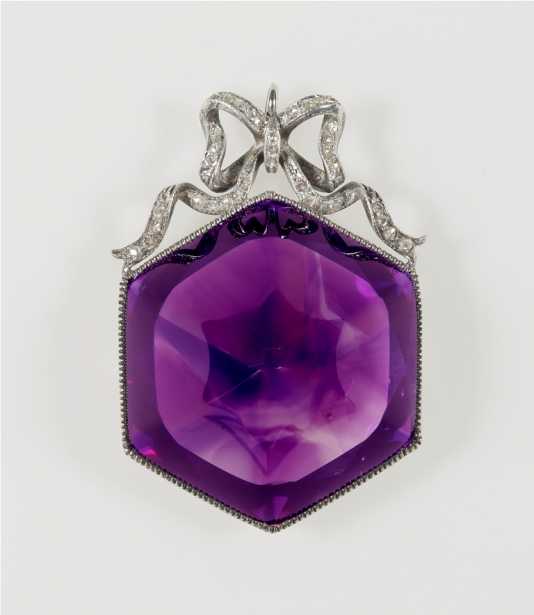 Silver, amethyst, and diamond brooch.jpg