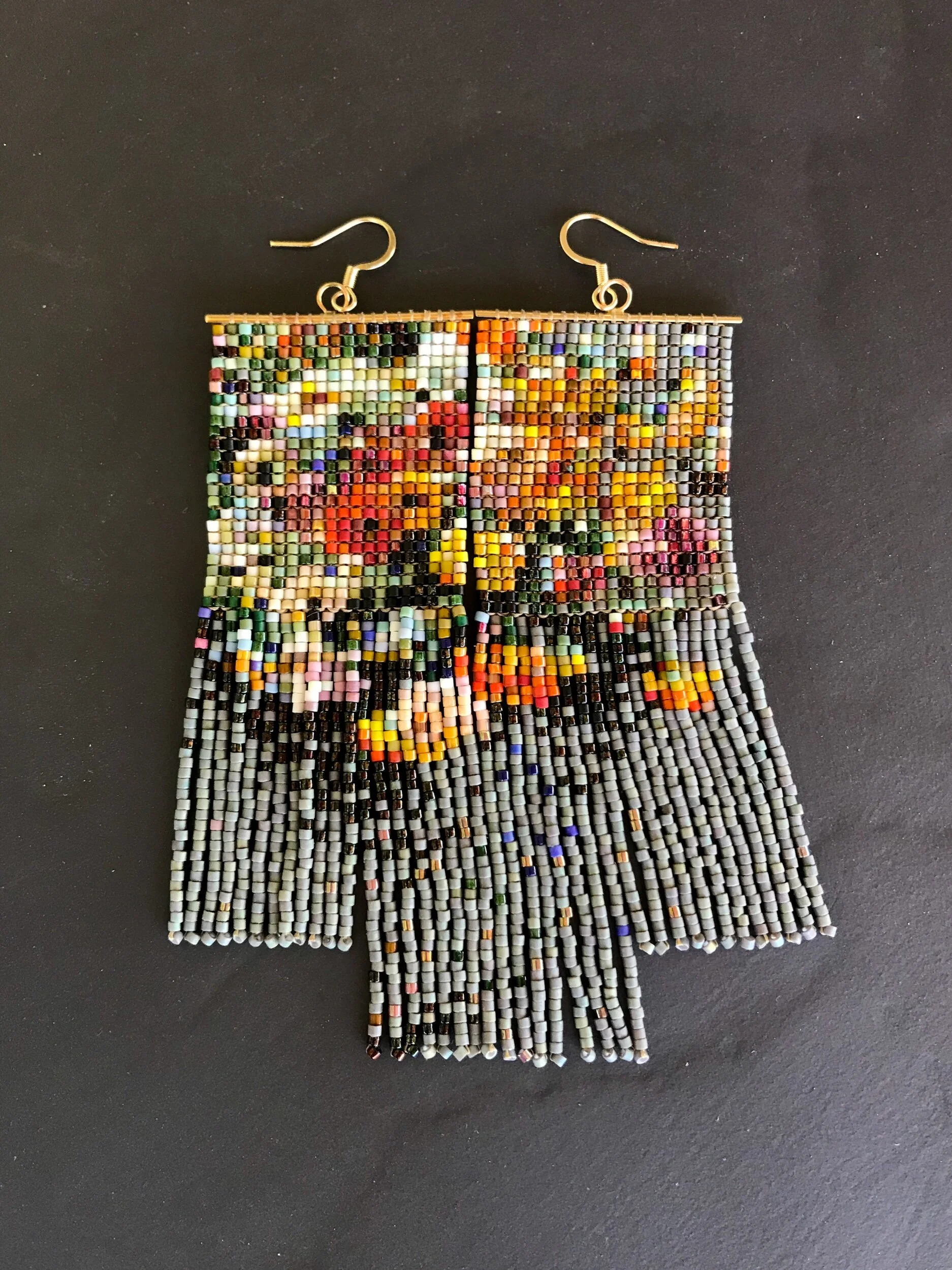 the CHRISTINE. poppy and ranunculus fringe earrings.