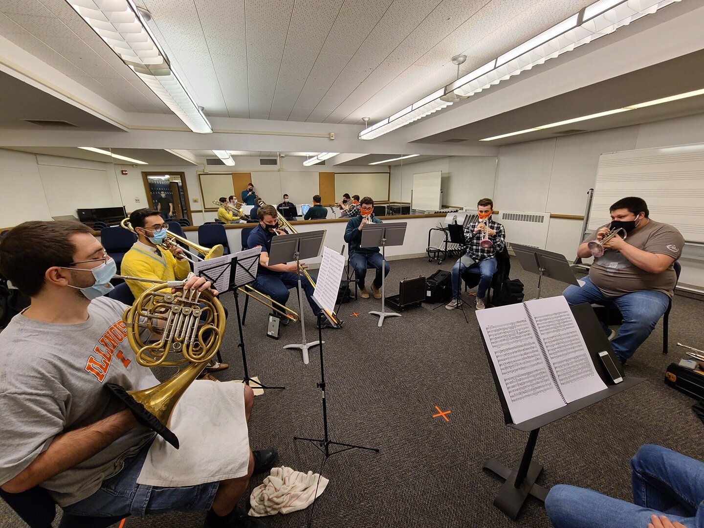 The Illinois Wind Symphony has been hard at work on several chamber works. Members of the brass section can be seen here preparing the &quot;Brass Sextet in E-flat Minor&quot; by Oskar B&ouml;hme with coaching help by graduate student Tim Loman. 

Un