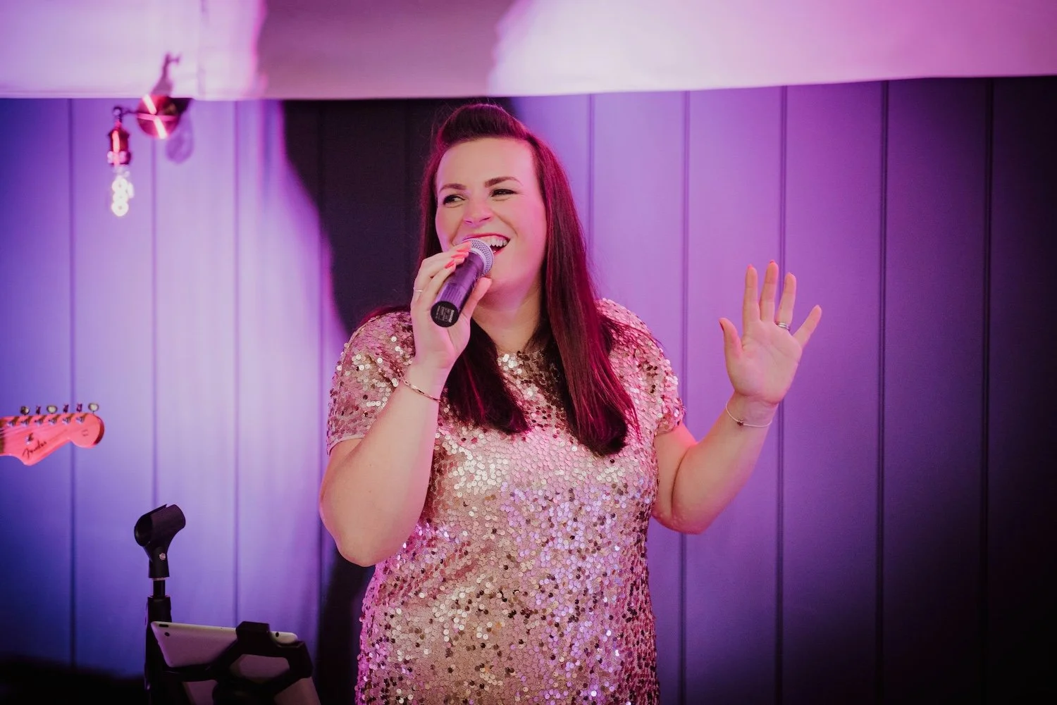 Katy Palmer, lead singer of Soulstar, performing at a wedding, providing live music and creating a lively, unforgettable atmosphere.