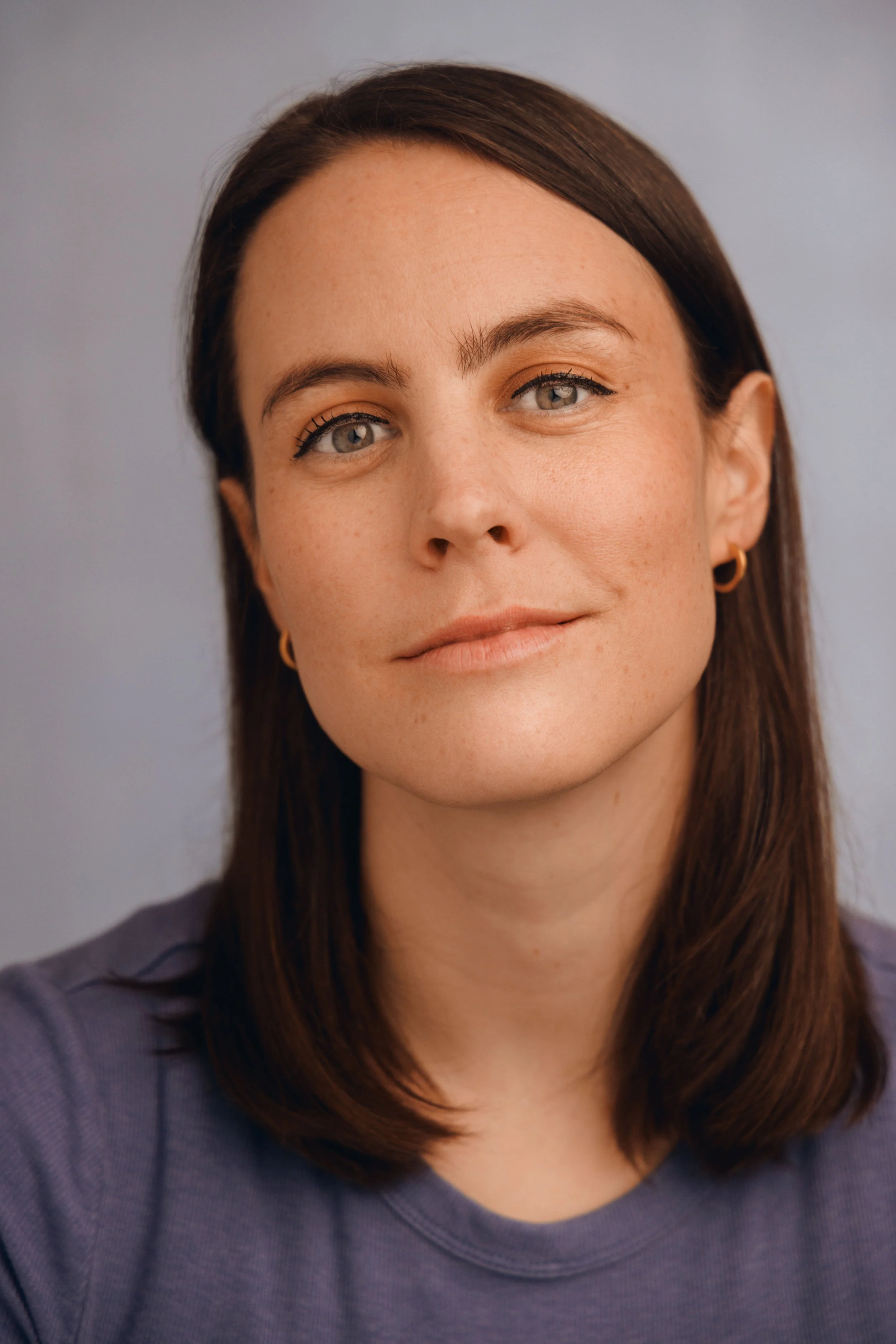 Blue Headshot copy.jpg