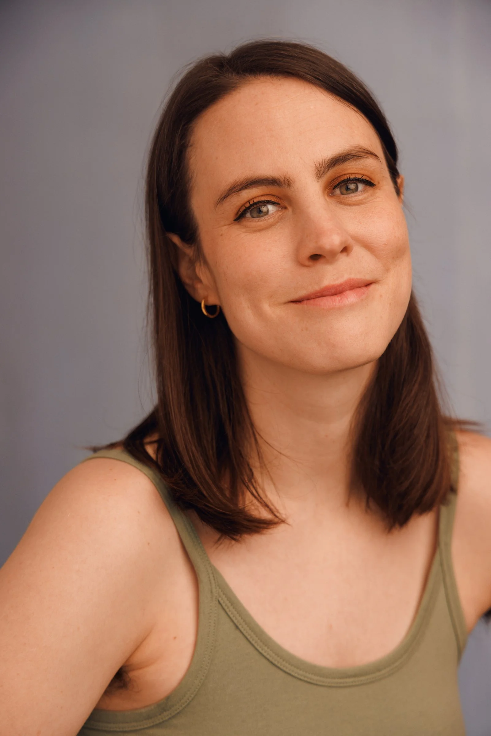 green shirt headshot.jpg