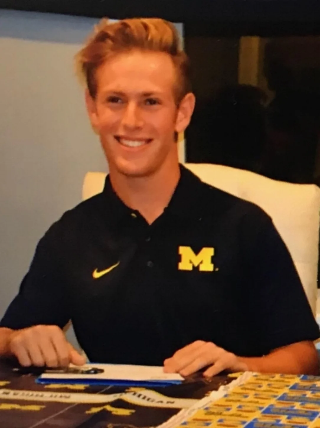 Teddy Burton 2019 Shortstop signing national letter of intent to play baseball at University of Michigan.