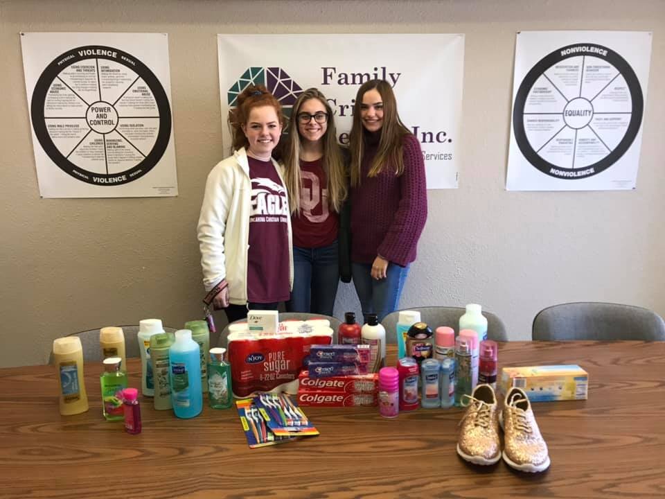Family Crisis Center girls with supplies.jpg