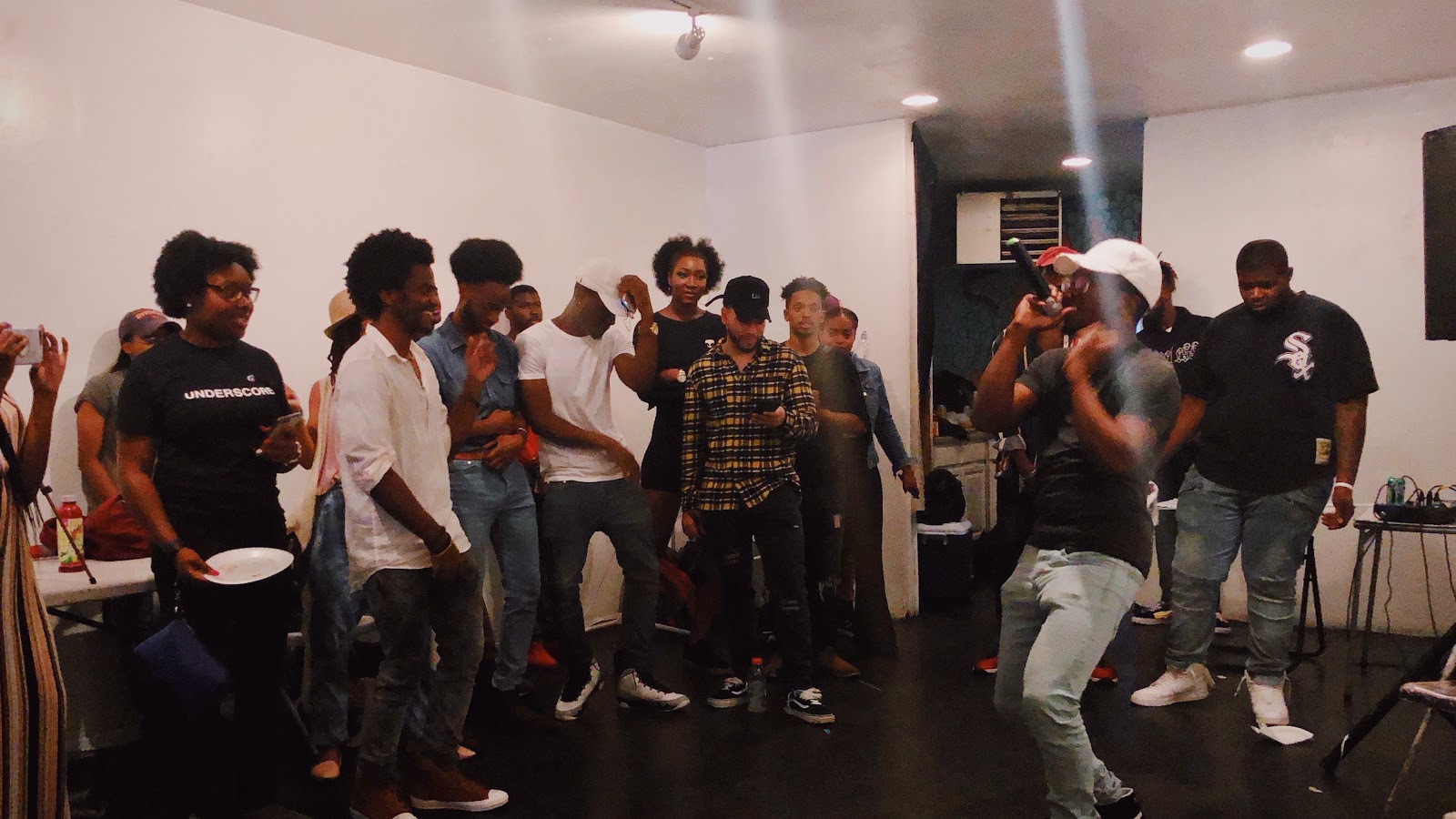 Rapper and singer Gregory Wilson hypes up the crowd and gets them dancing / Voiceless Music Meetup (PHOTO: Regan Hsieh)