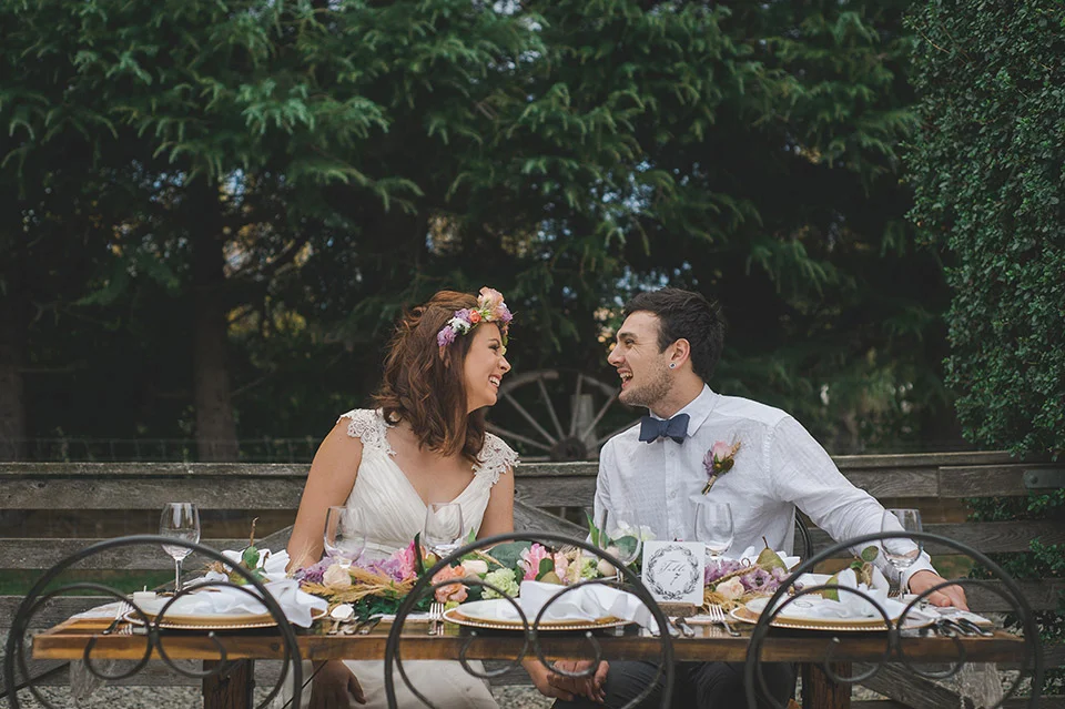 wedding couple at table
