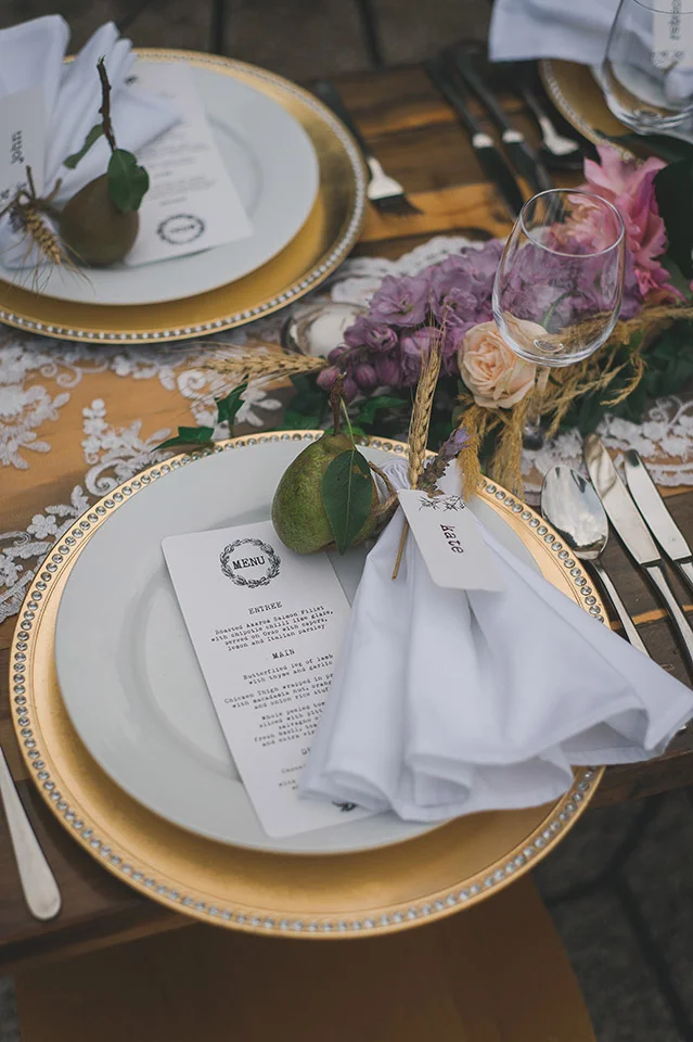 purple gold table setting