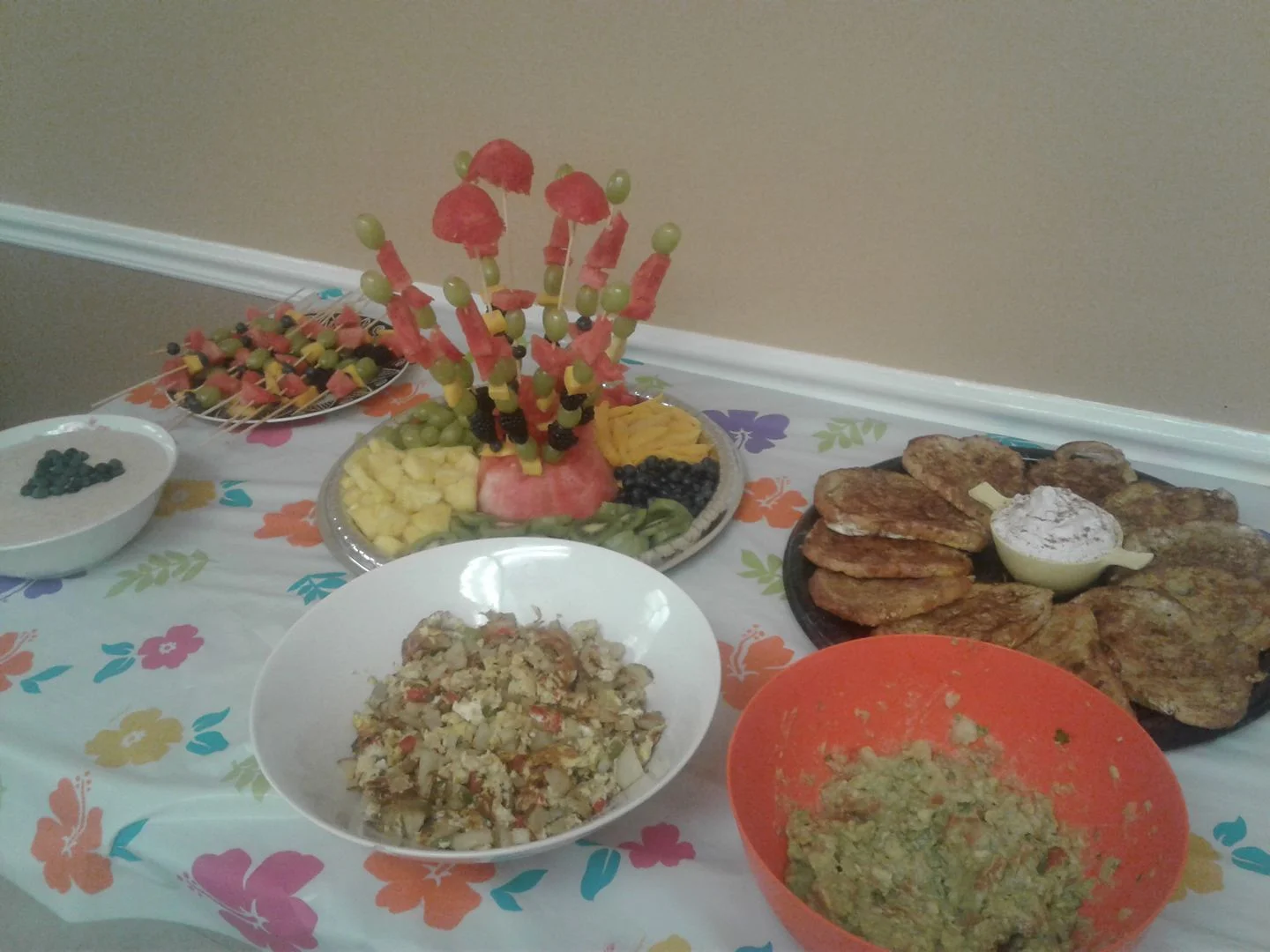 French toast with fresh whipped cream, guacamole, country potatoes & scrambled eggs, farina hot cereal topped with blueberries, and fresh fruit kabobs!