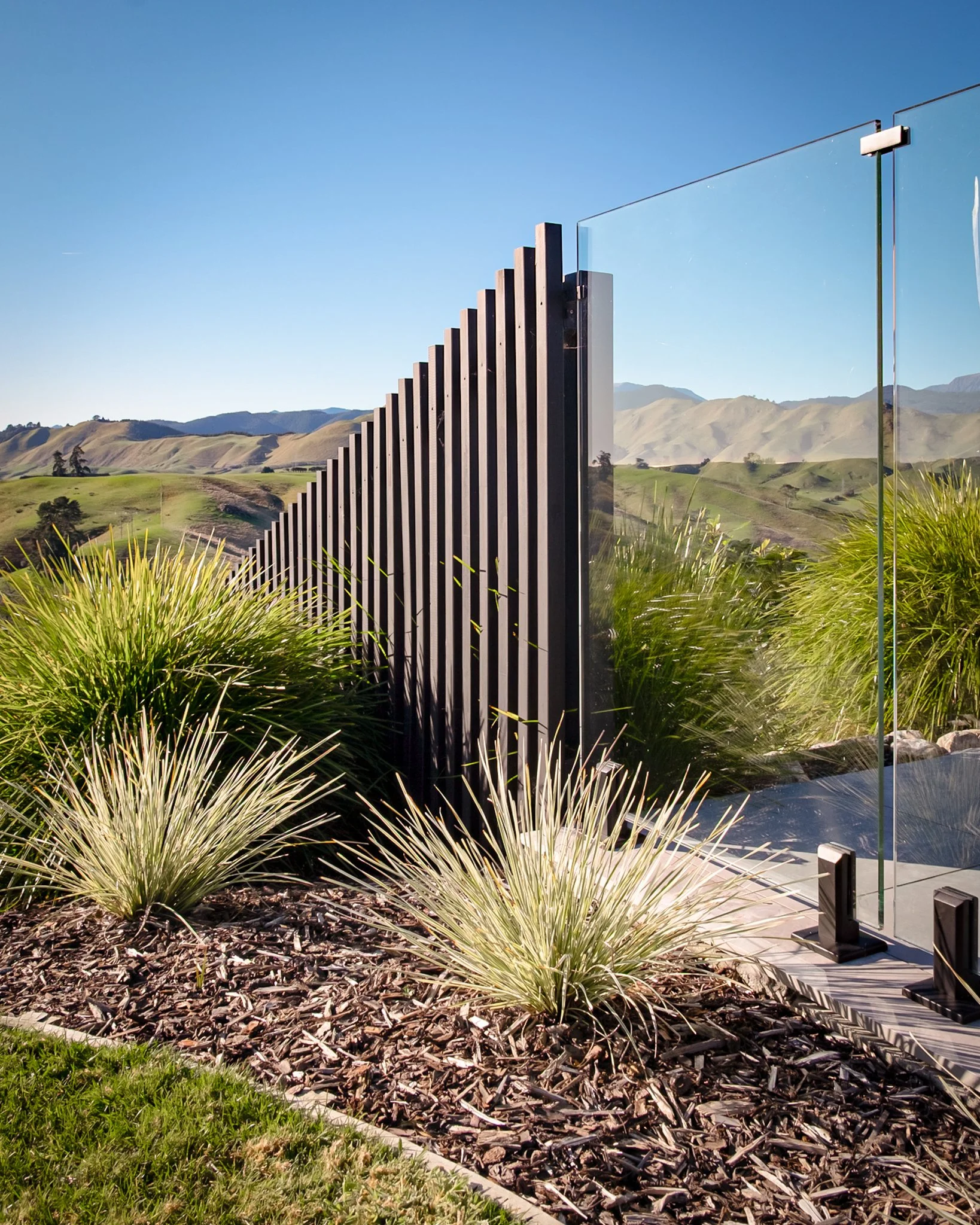 A combination of glass and batten fencing creates a stylish, fully compliant pool barrier that blends seamlessly into the surrounding landscape. 🏞
#newvisionlandscapes #nvl #nvp #nvpools #landscapearchitecture #landscapedesign #nvdesign #teamawesom