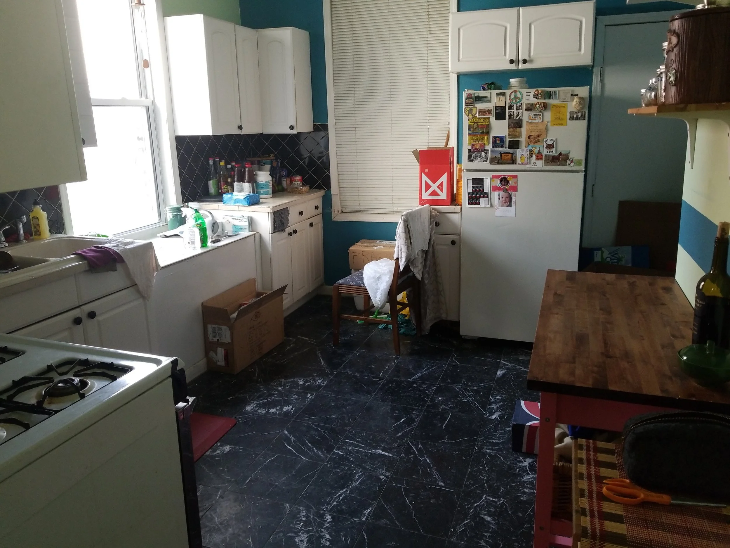 This is our kitchen looking ho hum rn.