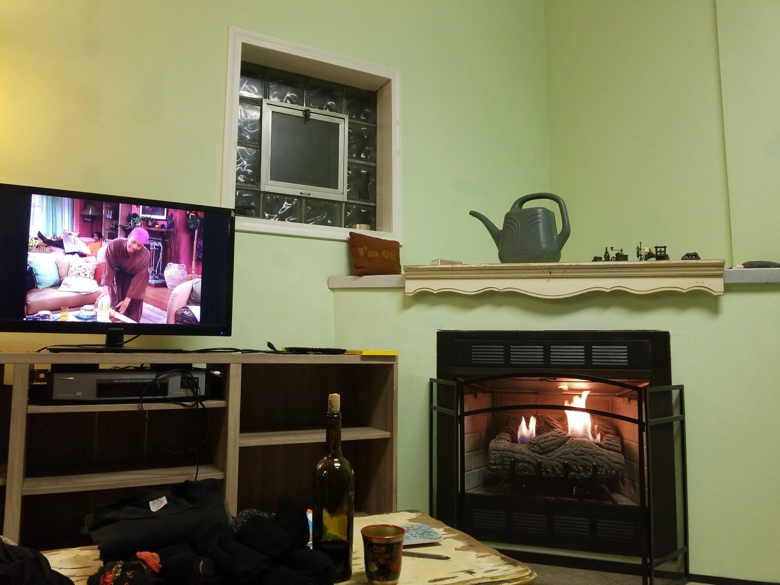 Our gas fireplace :) (I was watching Living Single and drinking wine while I did my laundry. Officially bougie.)