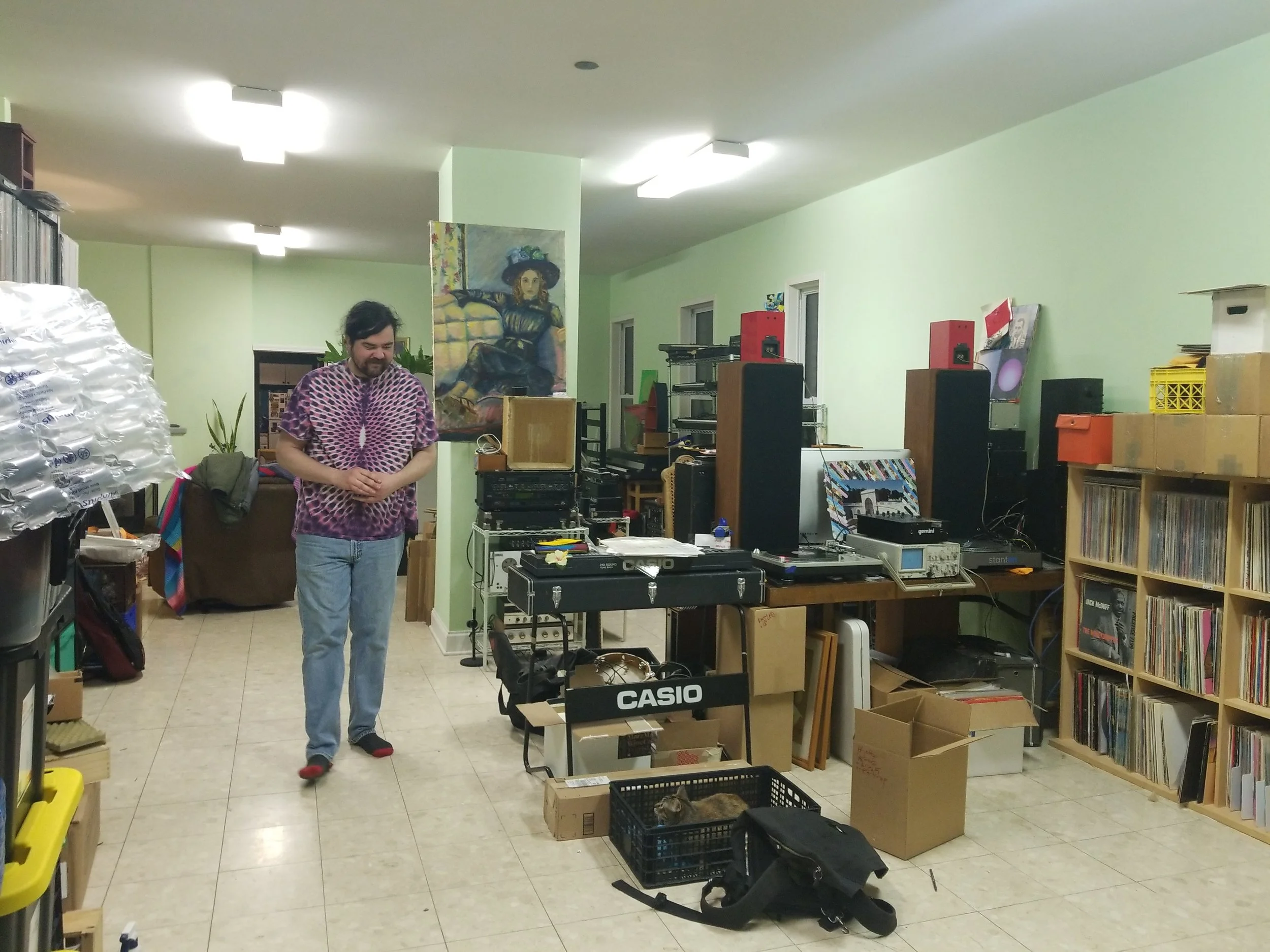 new pad, when you walk in the front door. Tom’s records and electronics.
