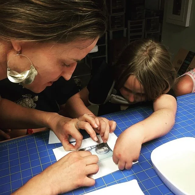 Oceanna helping a student do her first Polaroid transfer!