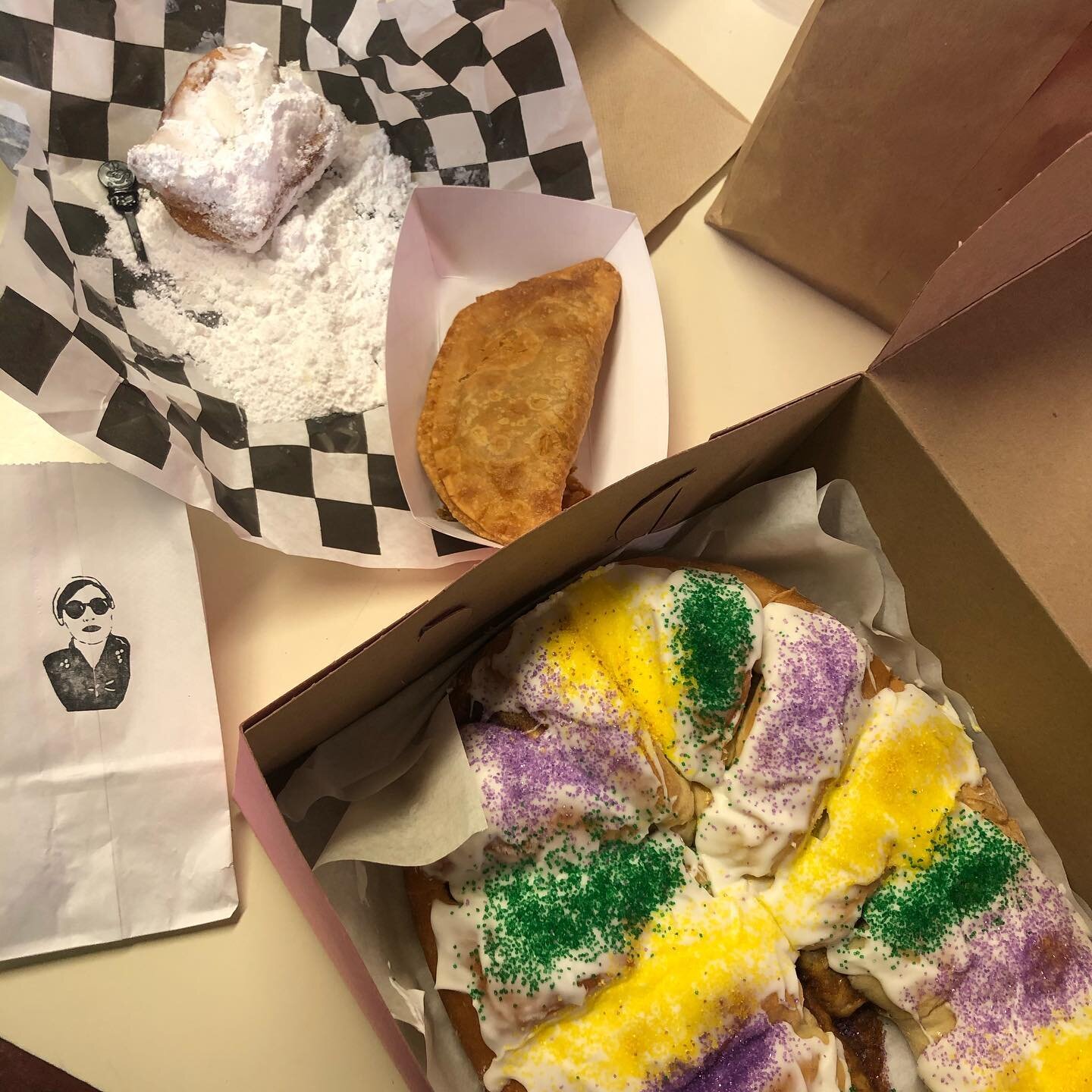 Our employees enjoyed an awesome lunch from @junebugchicago ! We had meat pies, beignets, gumbo(not pictured), and king cake! Check this place out! They&rsquo;re soo good! #shoplocal #supportsmallbusiness #junebugcafe #hagensfishmarket