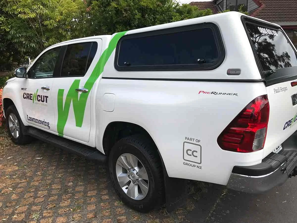 Crewcut car in driveway