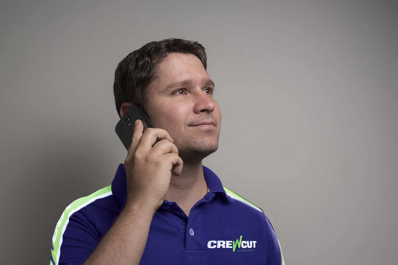 Crewcut operator calling clients