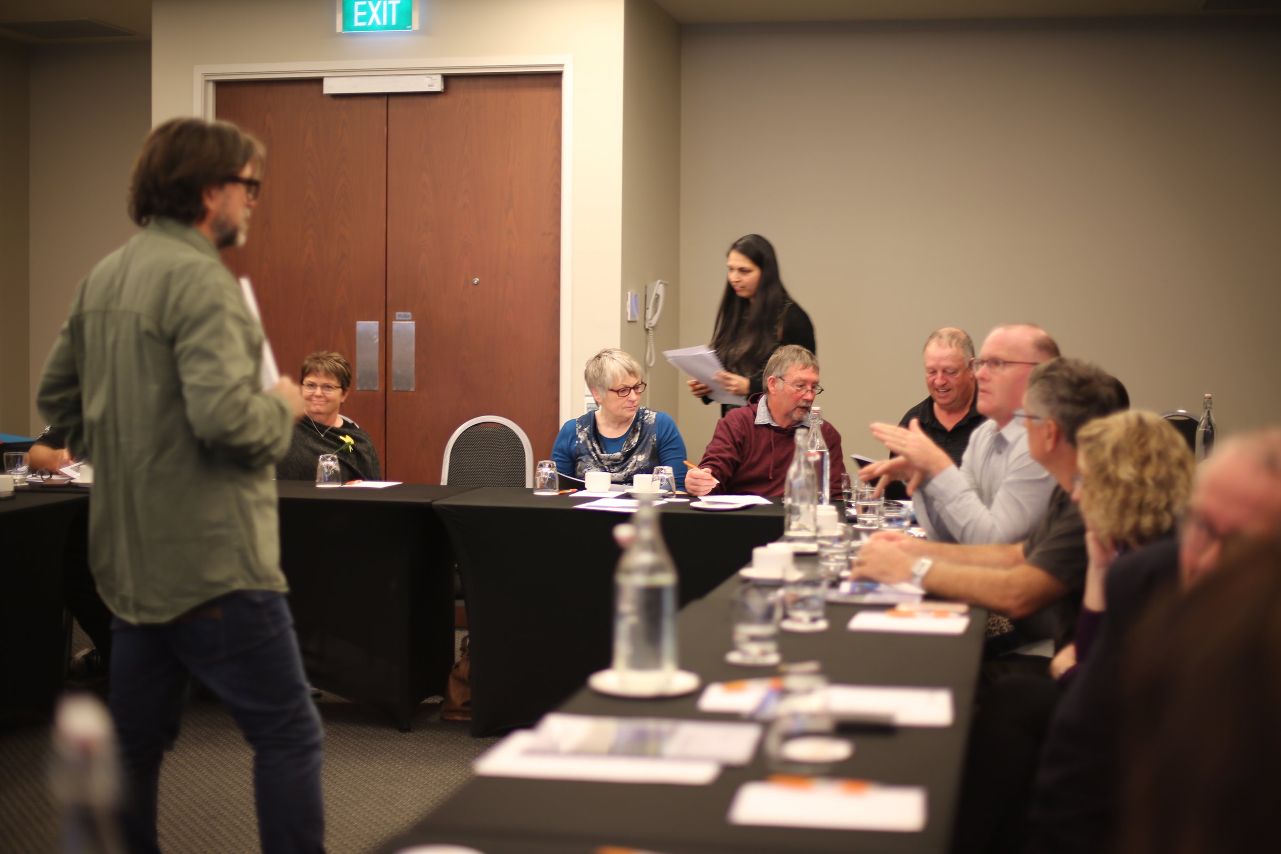 David Serville having a discussion with Tauranga regional manager Bernard Satherley