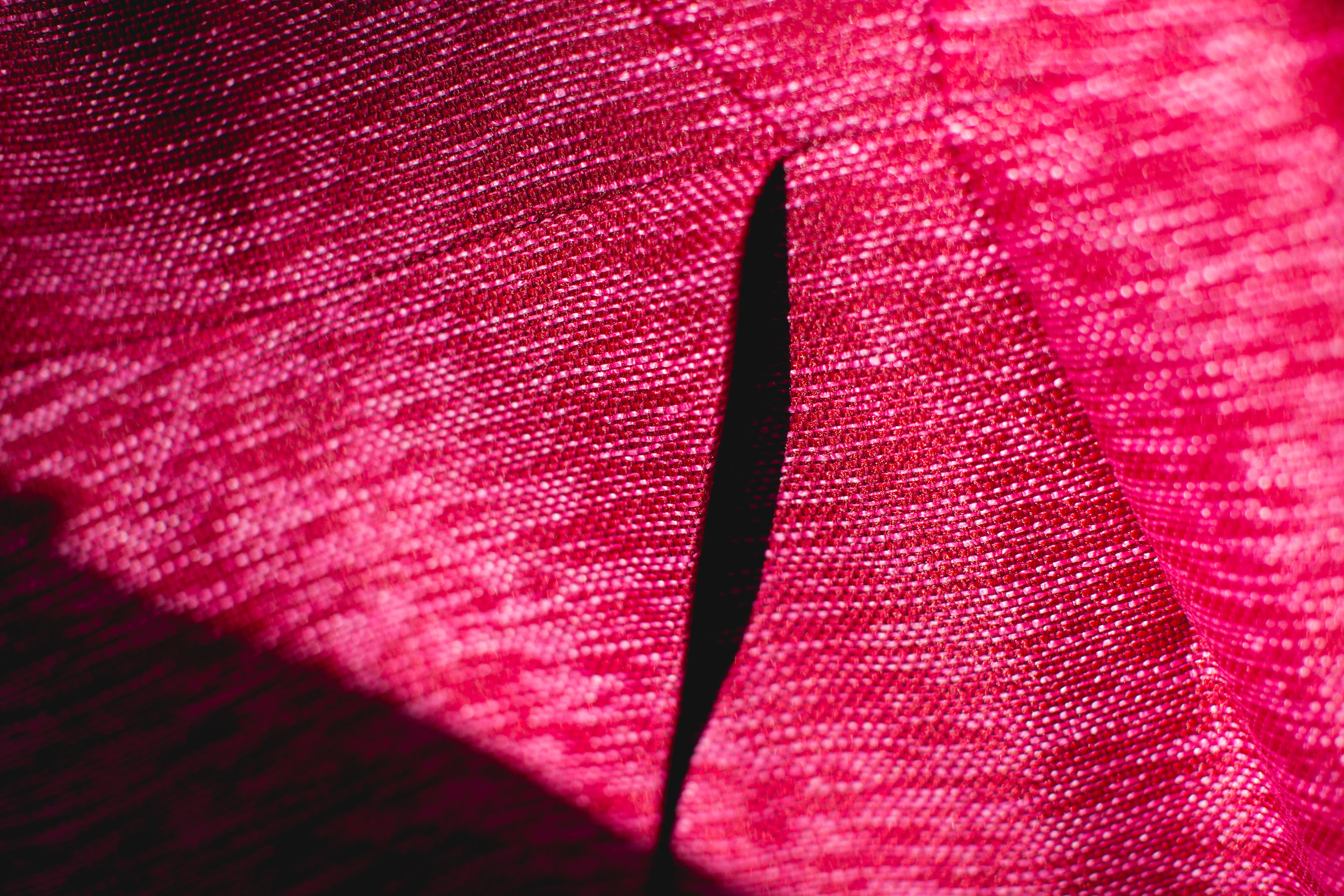 Lifestyle-detail-of-a-pink-dress-in-light-and-shadow-london-stylist