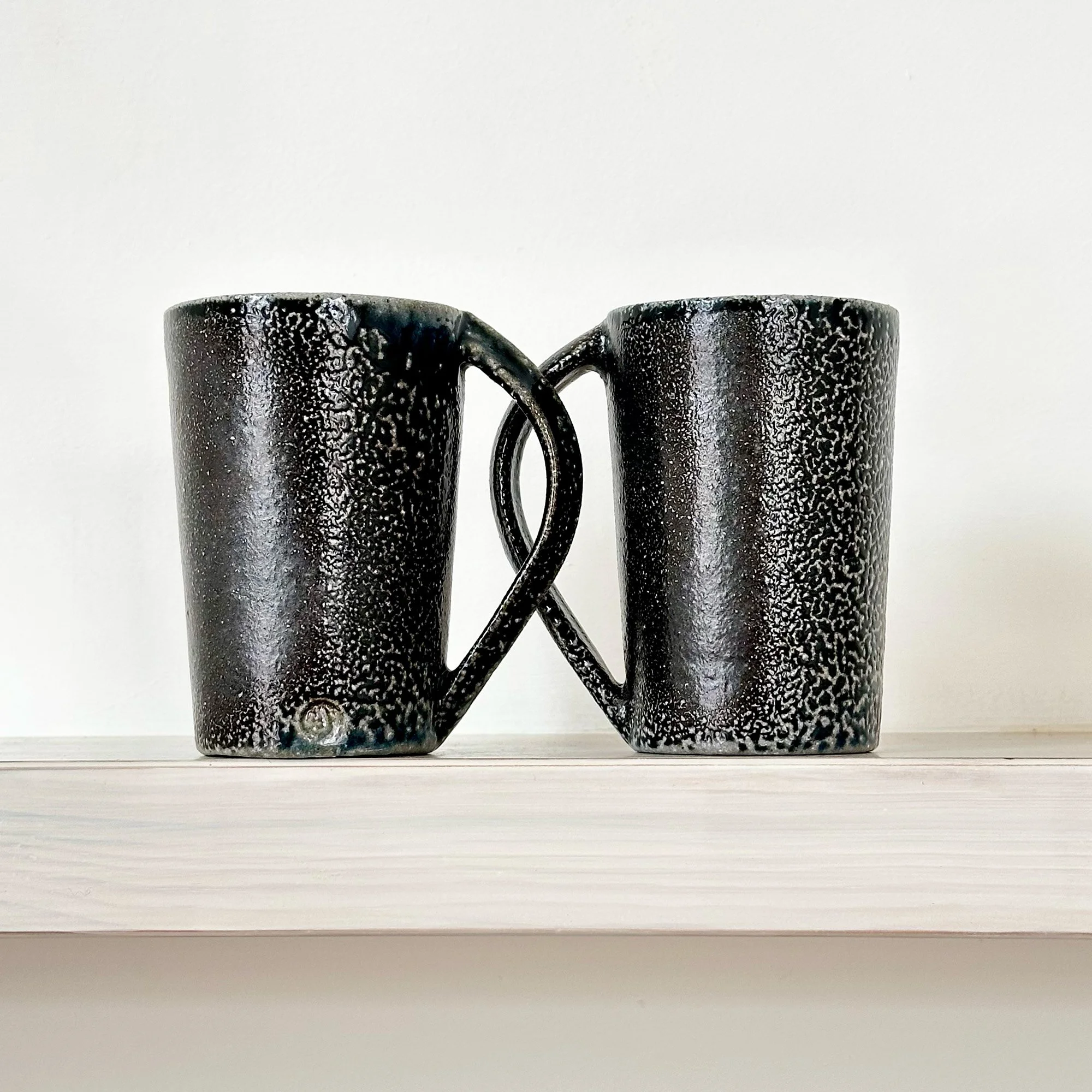 Pair of Tall Black Mugs