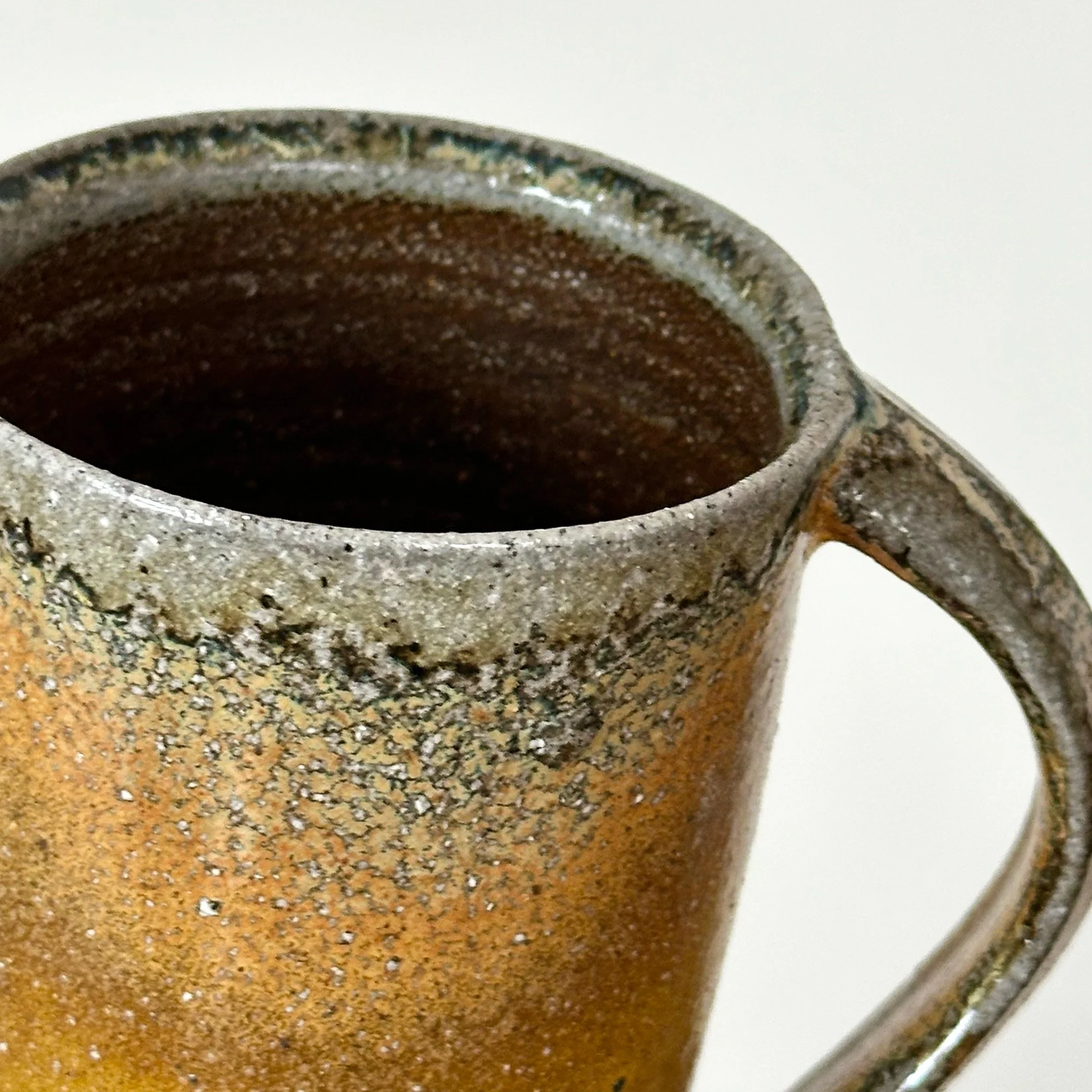 JSP173 Ochre Tall Mug 3-4.jpg