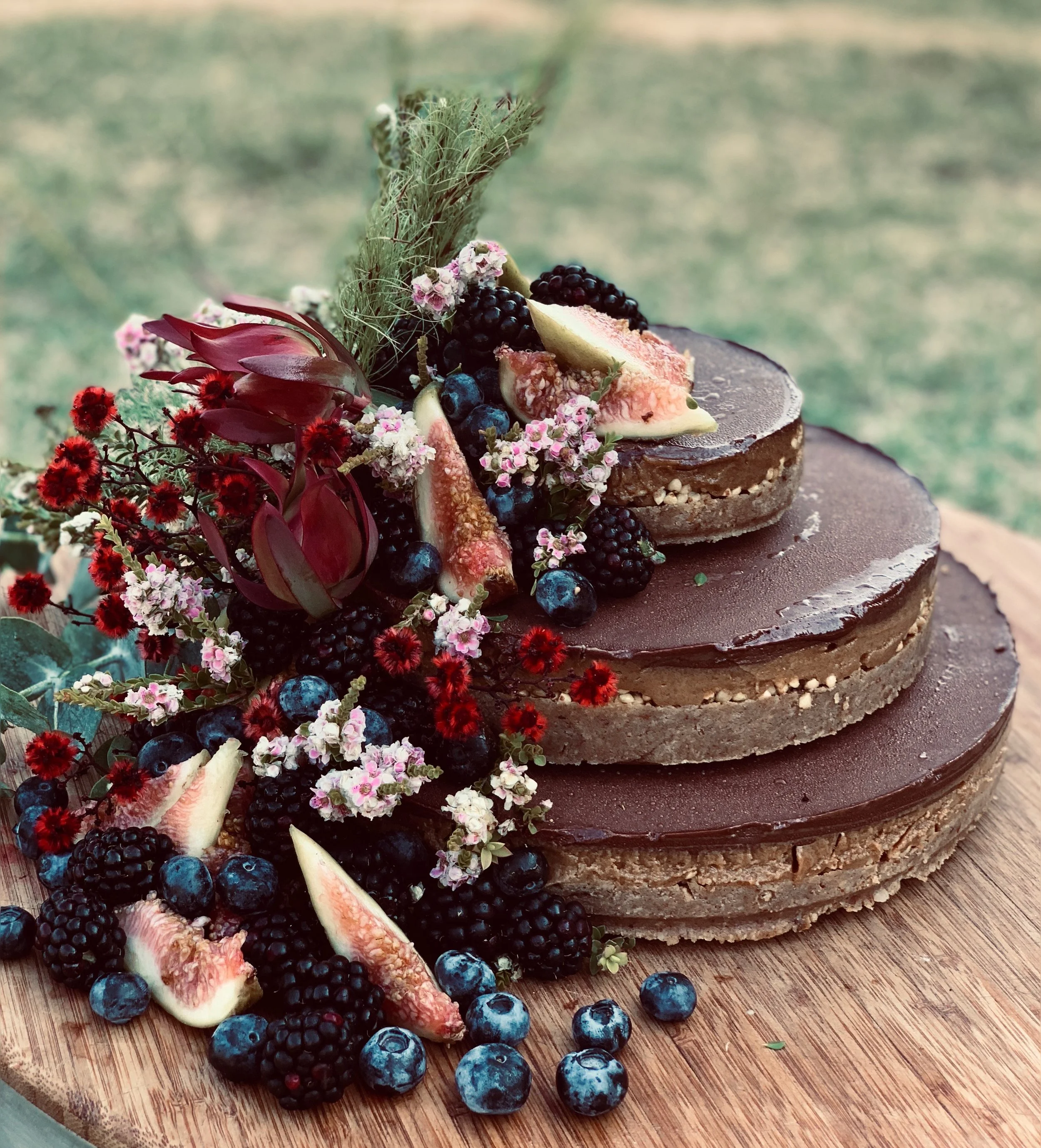 Salted caramel cake with caramelised buckwheat crunch topped with medicinal cacao icing