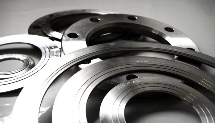 A gasket is a simple piece of a mechanical seal between two or more mating surfaces, typically between flanges or valves in a piping system, generally preventing leakage.