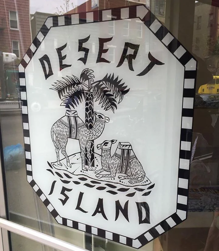 Desert Island comic shop New York door sign