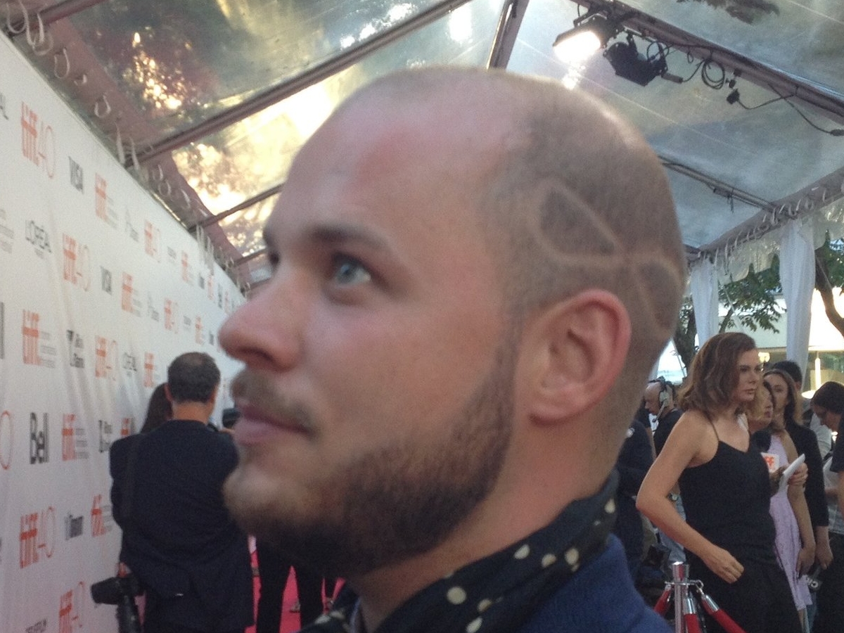  guy with infinity on his head 
