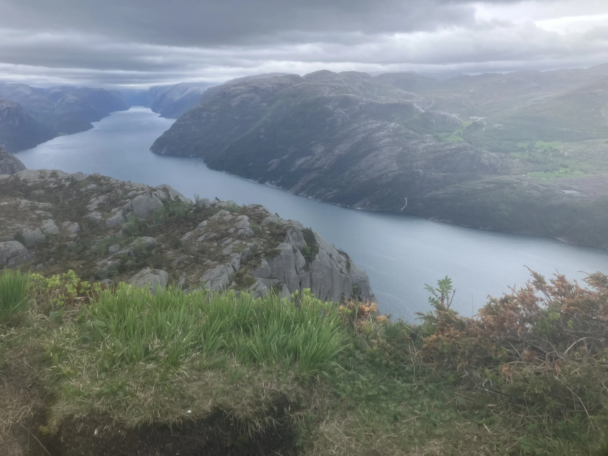 Preikestolen hike overlooking Lysefjord in changing weather